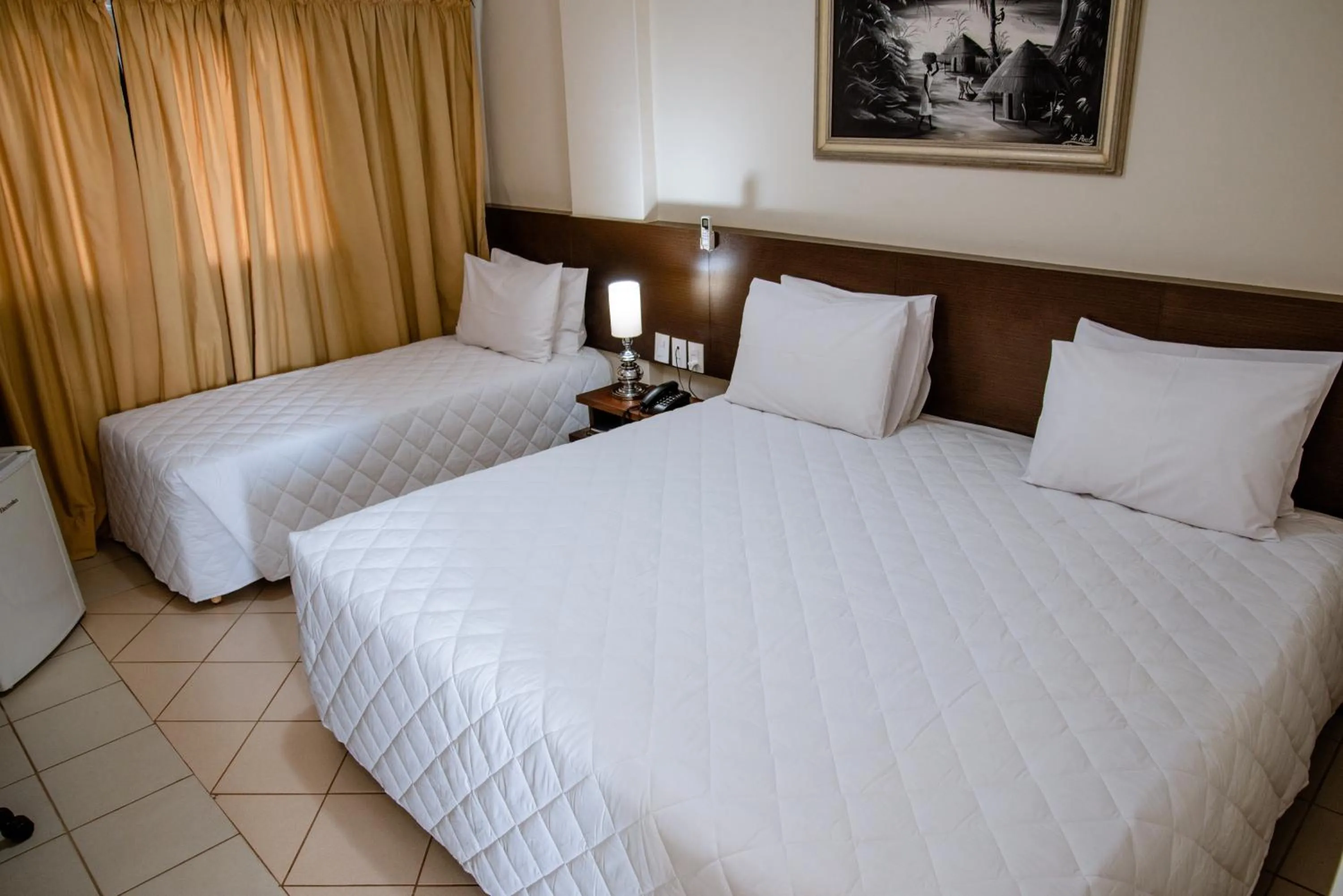 Bed in Imperador Palace Hotel Franca