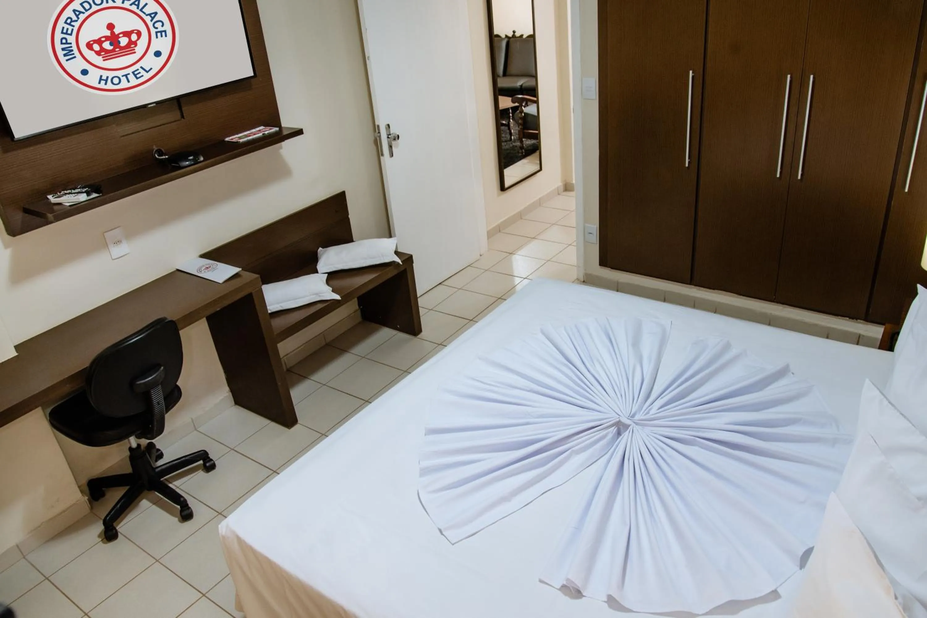 Bed in Imperador Palace Hotel Franca