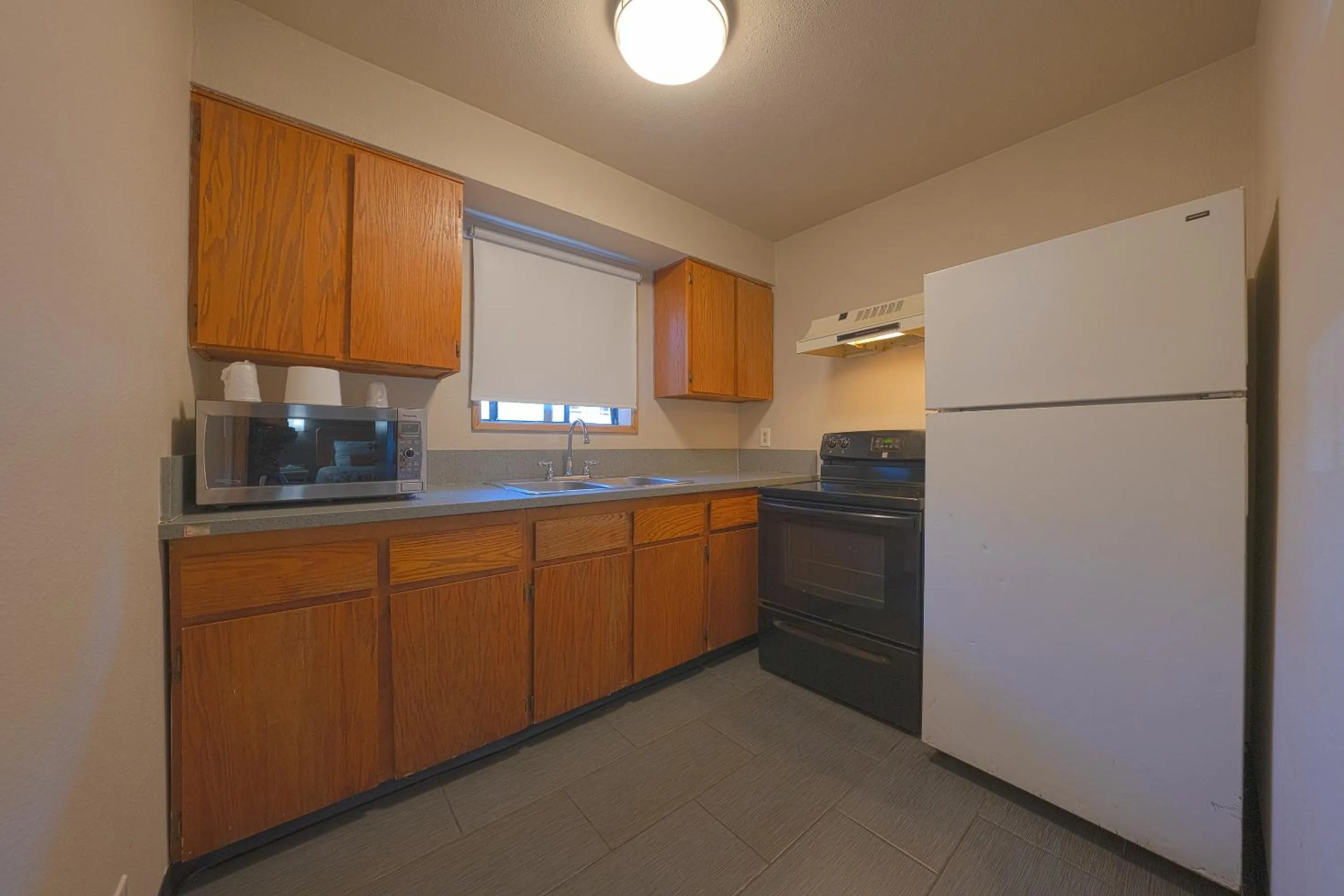 Bedroom in Budget Inn Gladstone By OYO - Portland Clackamas