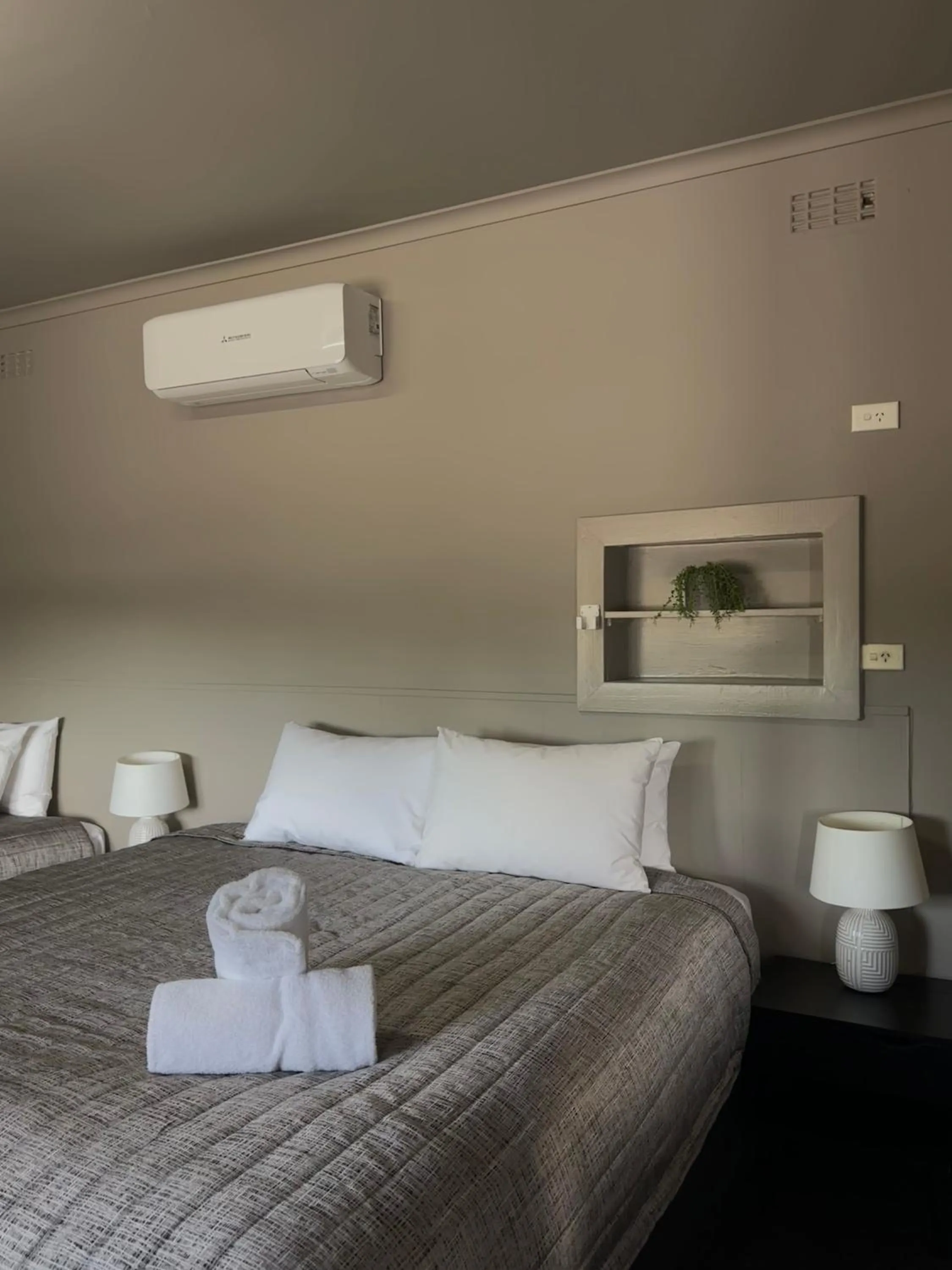 Bed in Calder Family Motel