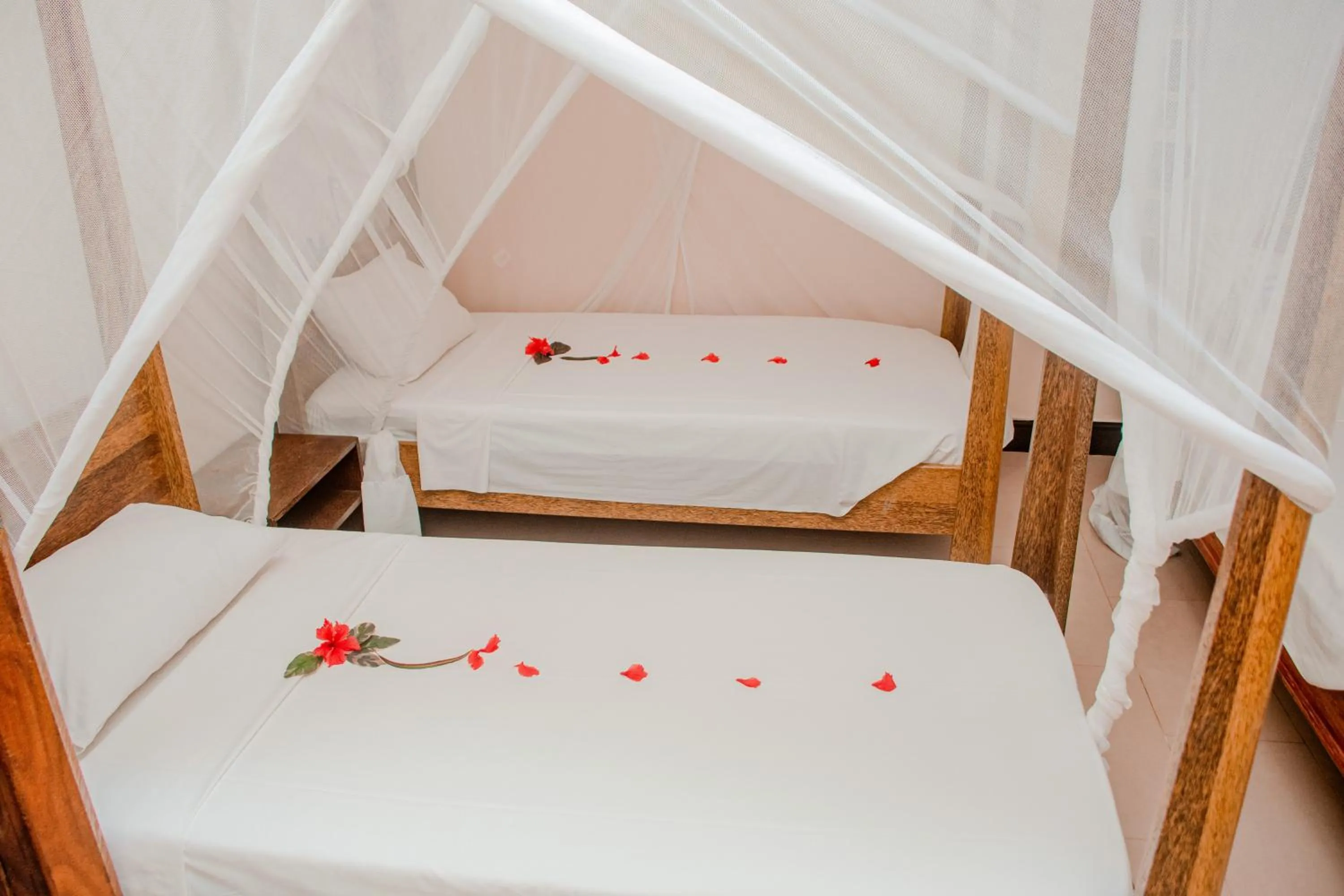 Bedroom, Bed in Mnarani Beach Cottages