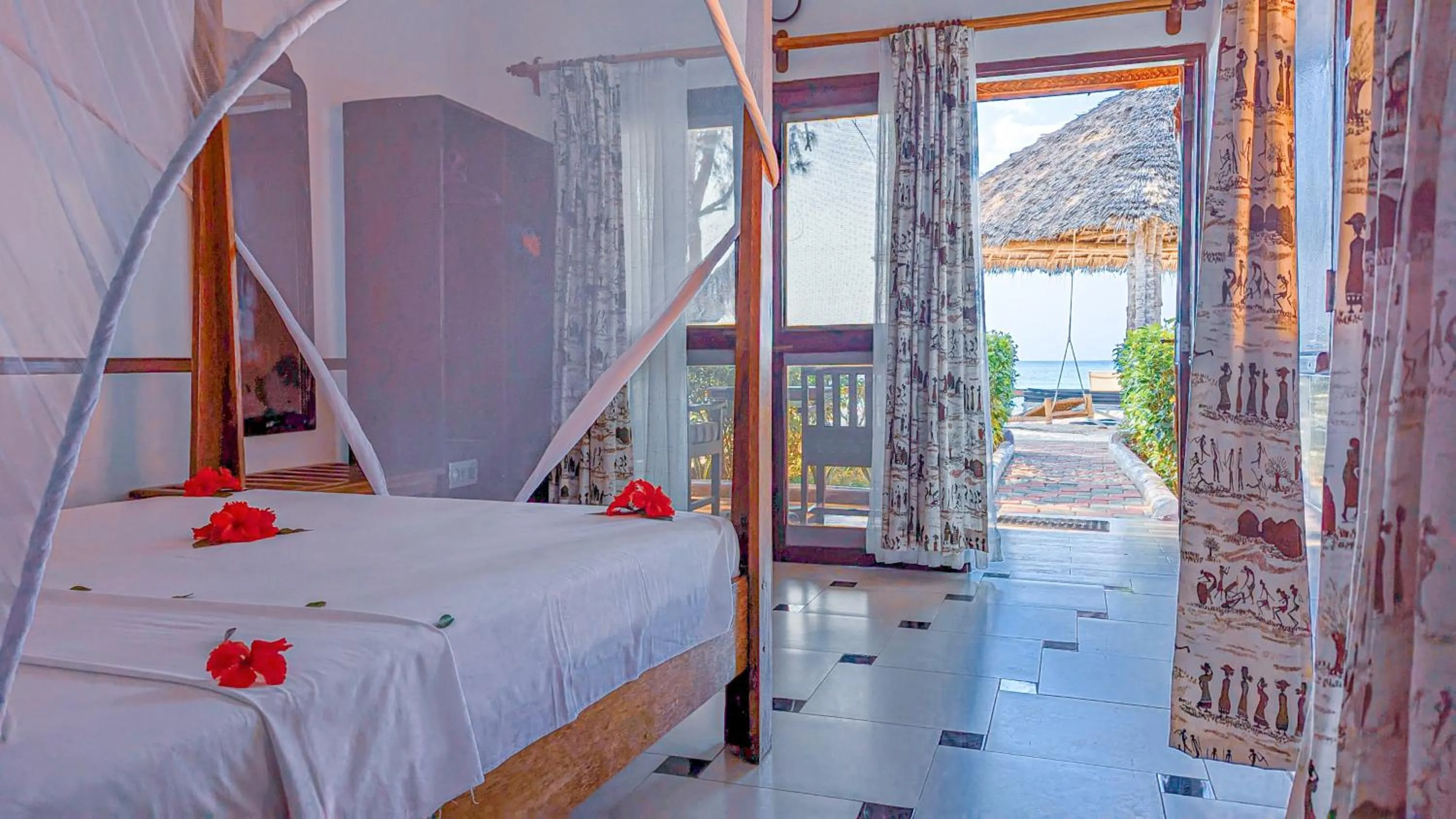 Photo of the whole room, Bed in Mnarani Beach Cottages