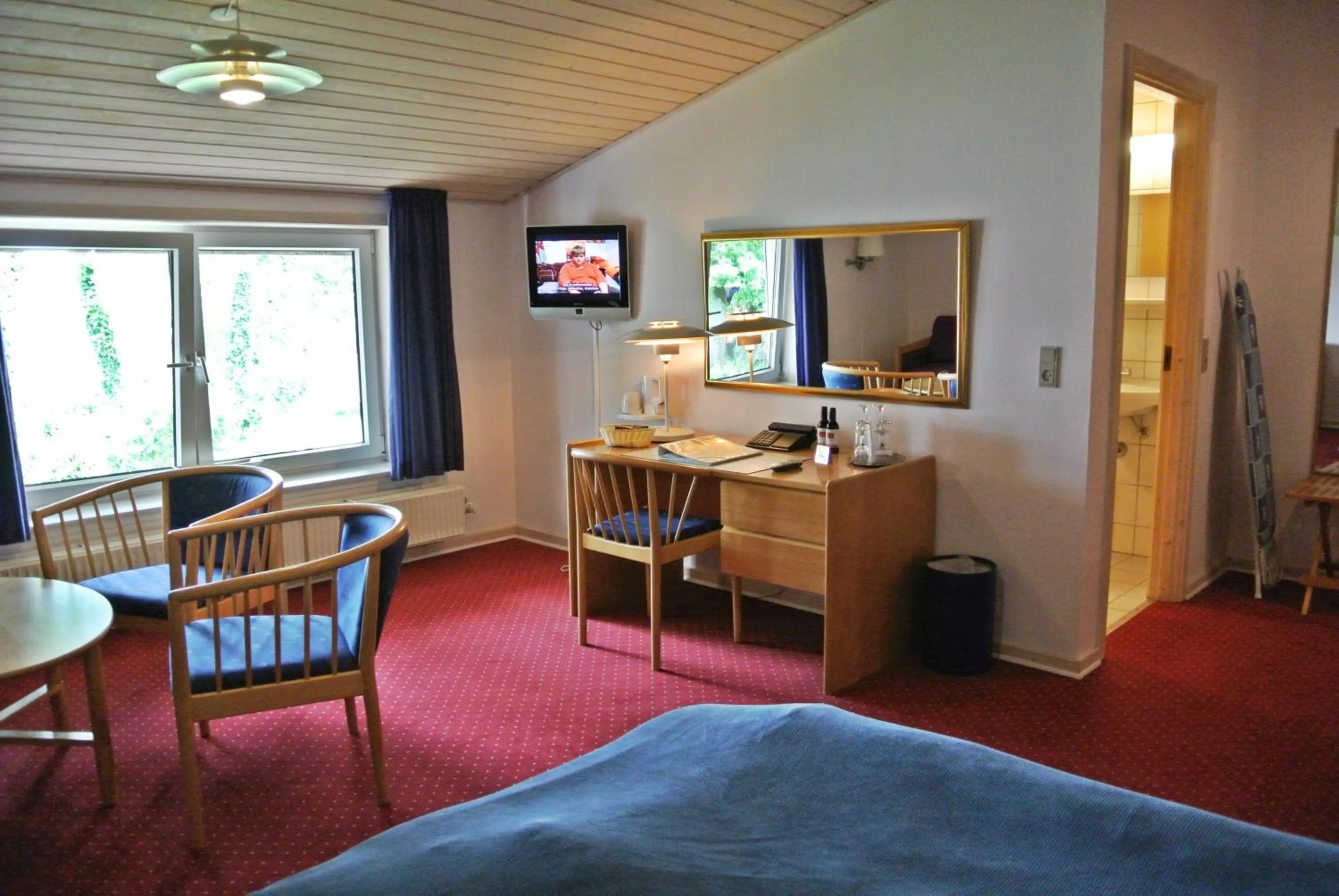 Seating area, Bed in Agerskov Kro & Hotel