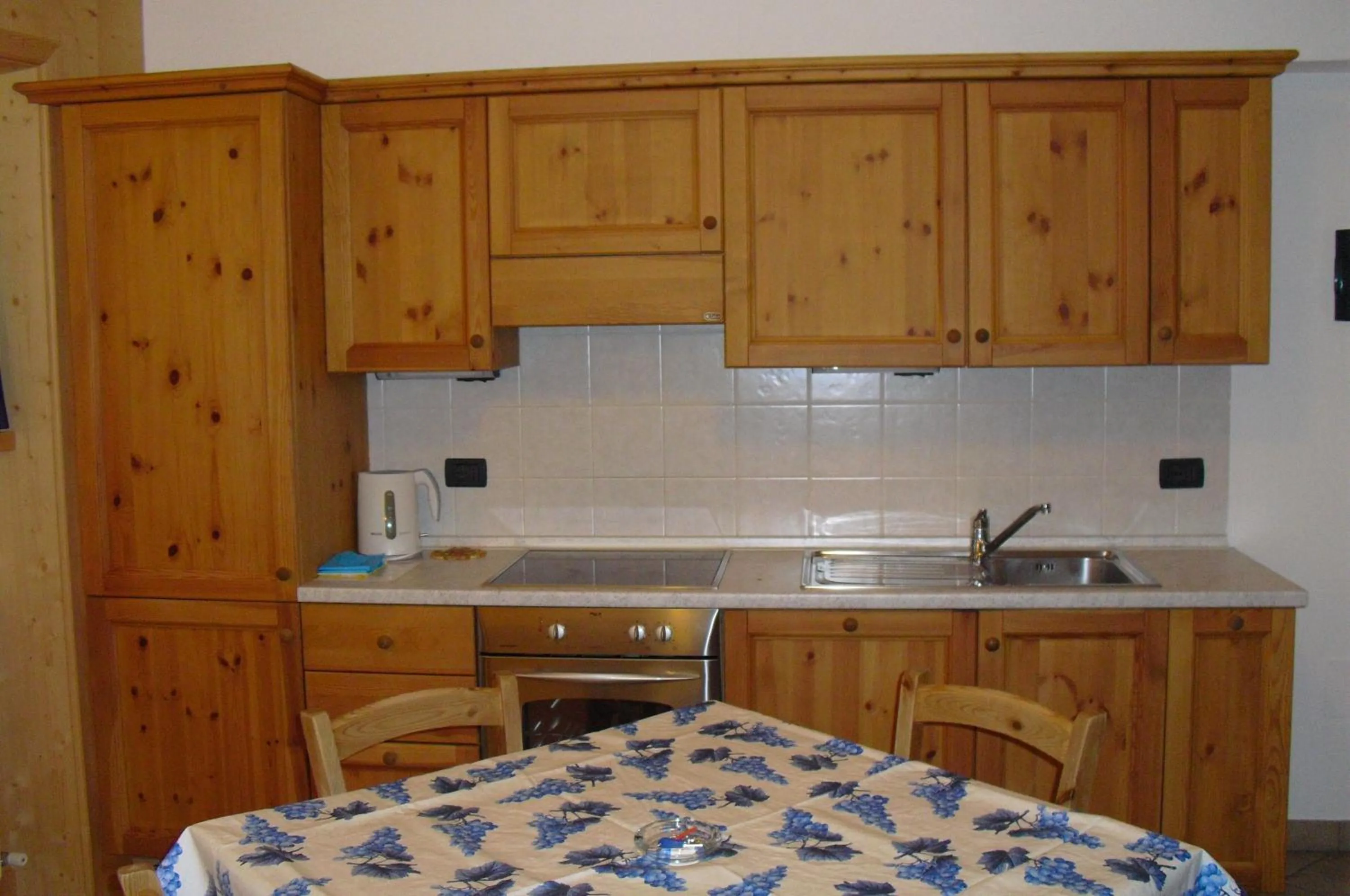 Kitchen or kitchenette in Casa Vacanze Sablonera