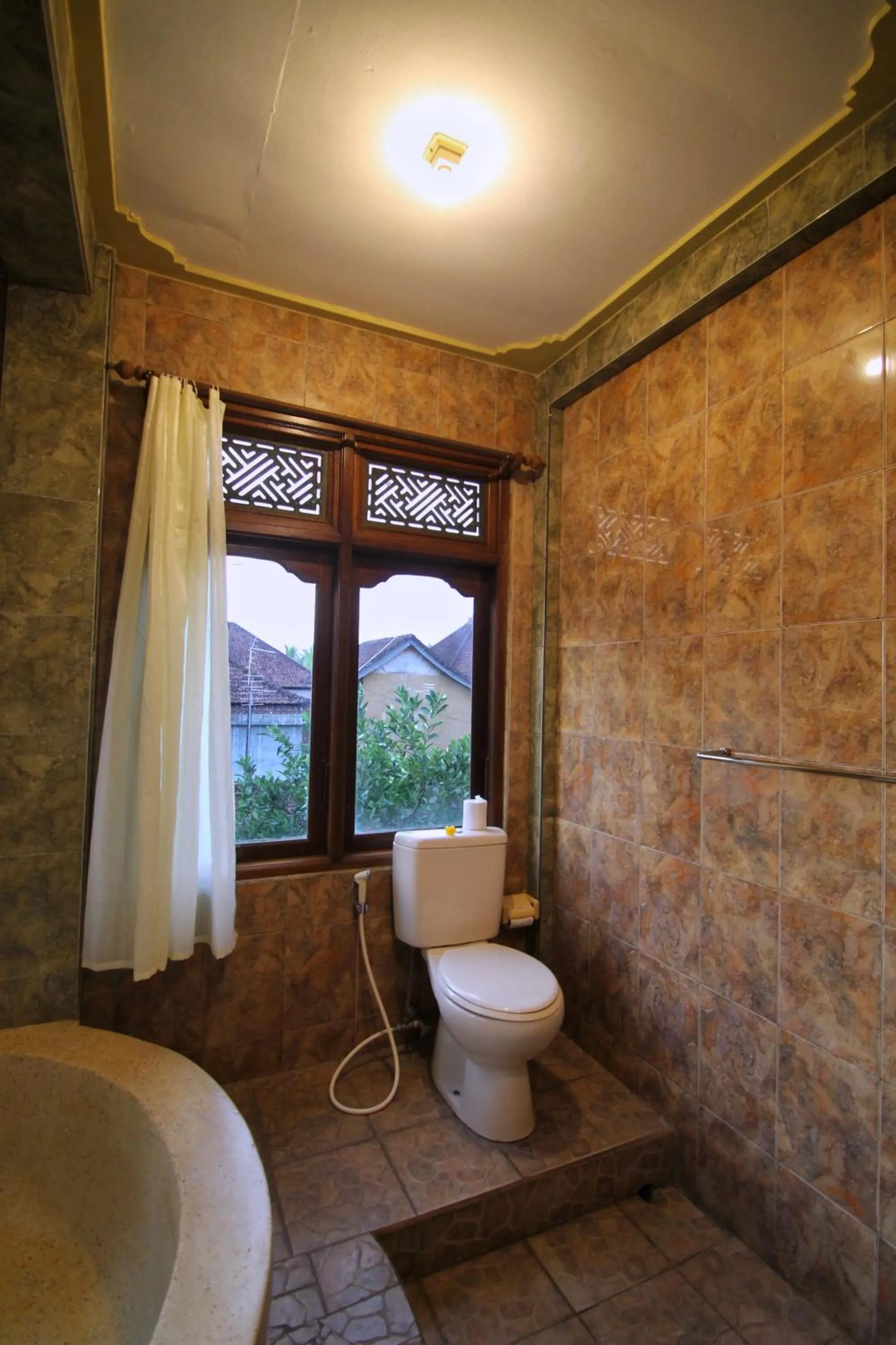 Toilet in Hibiscus Cottages