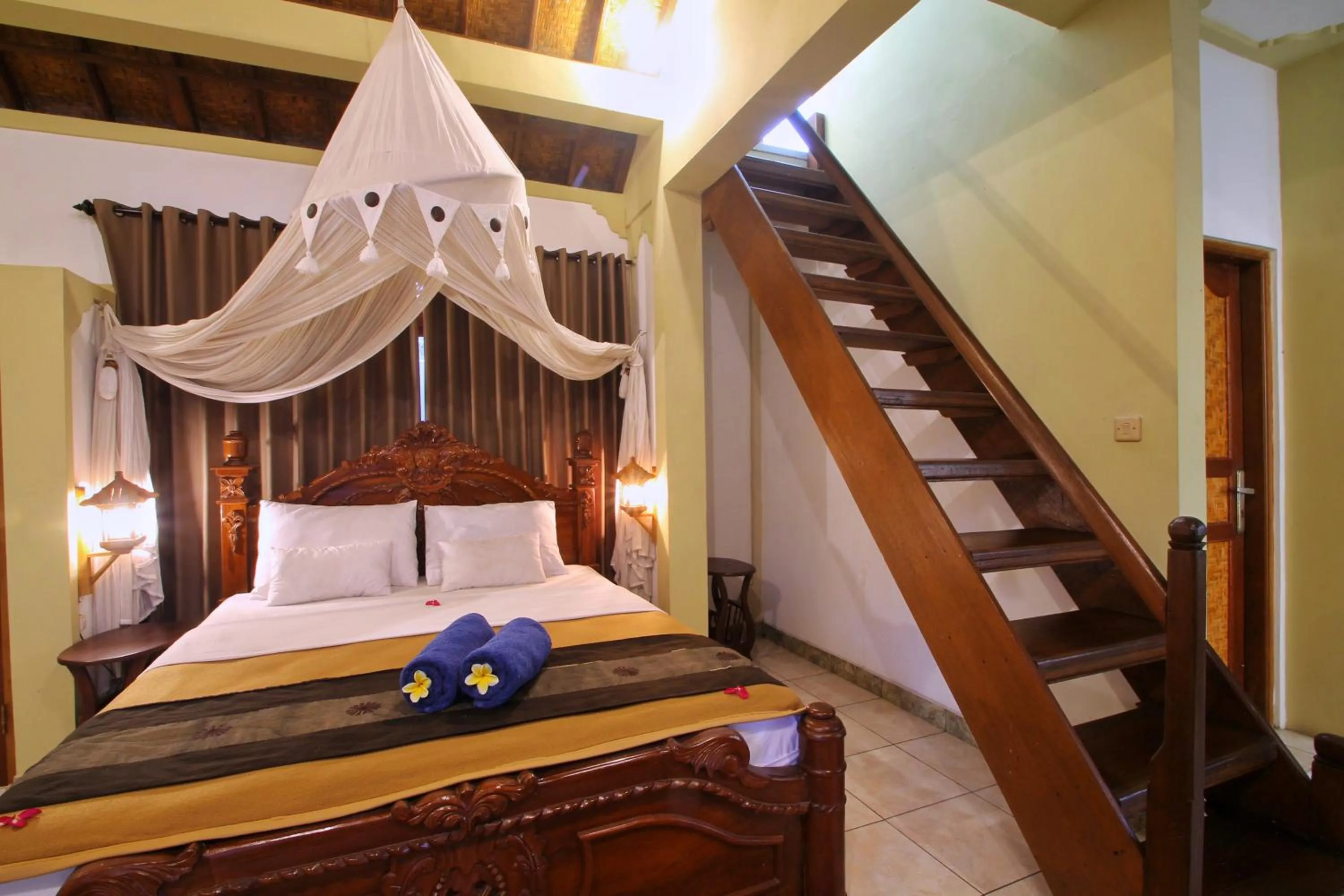 Bed in Hibiscus Cottages