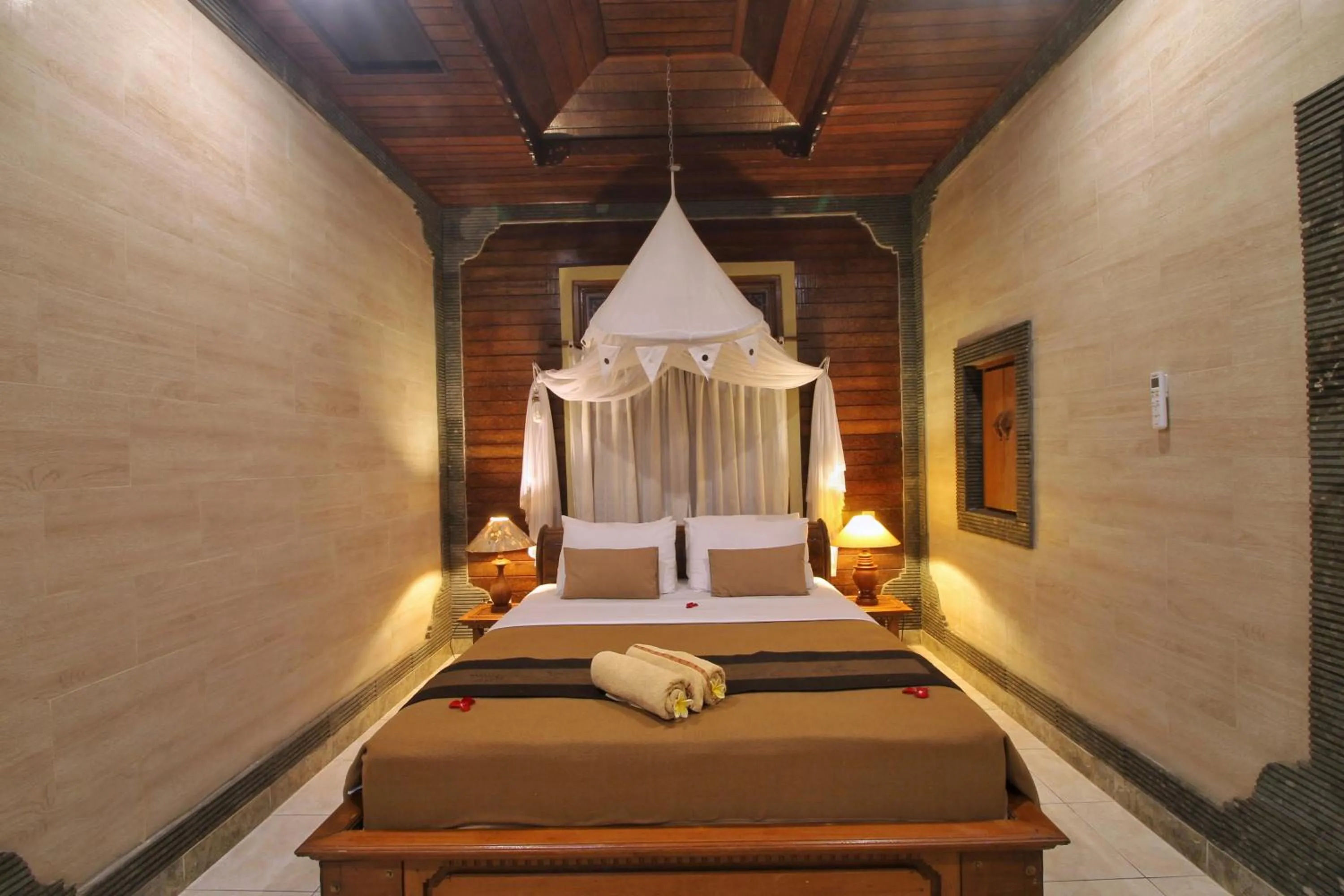 Bed in Hibiscus Cottages