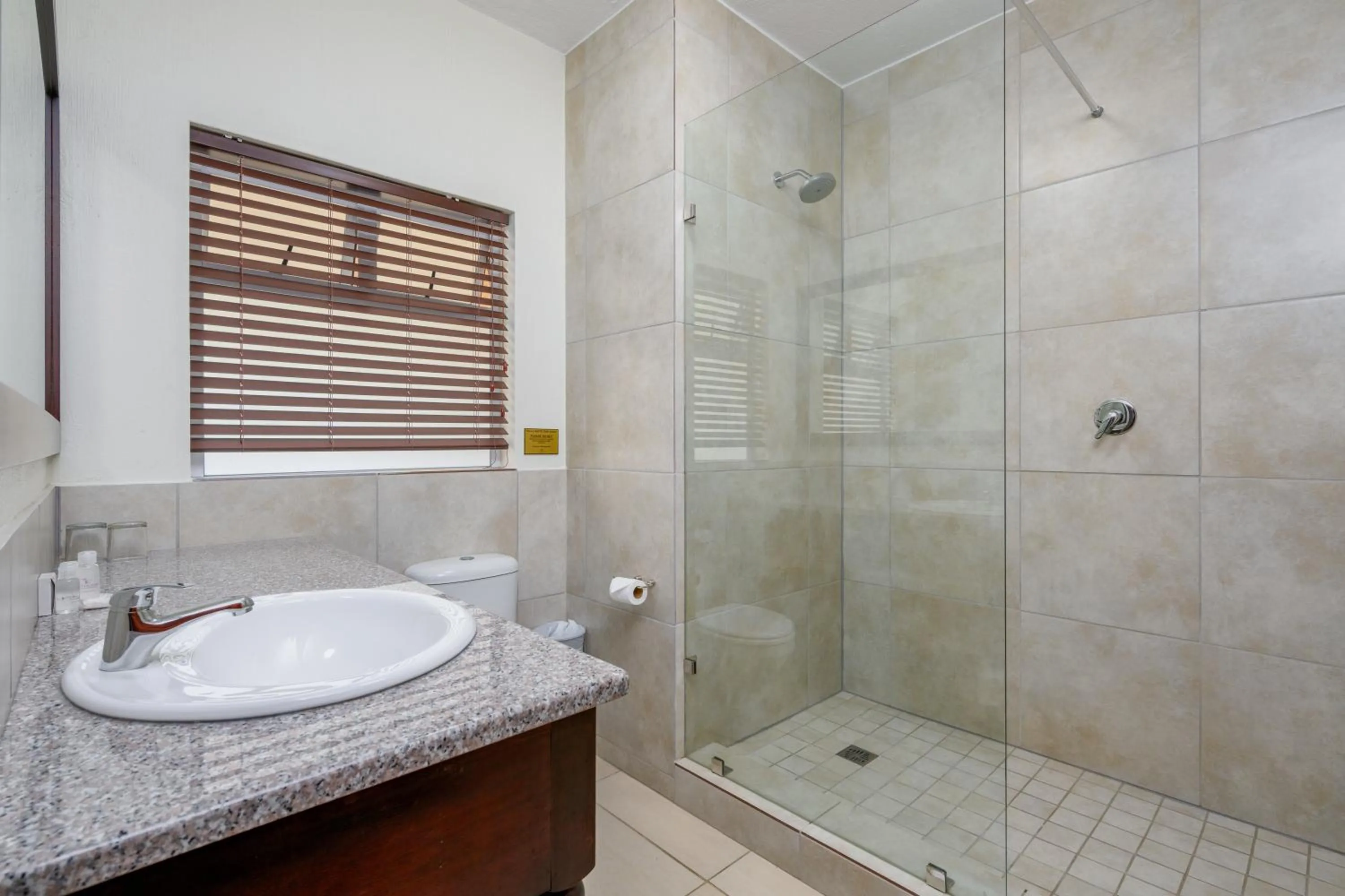 Bathroom in Umthunzi Hotel and Conference
