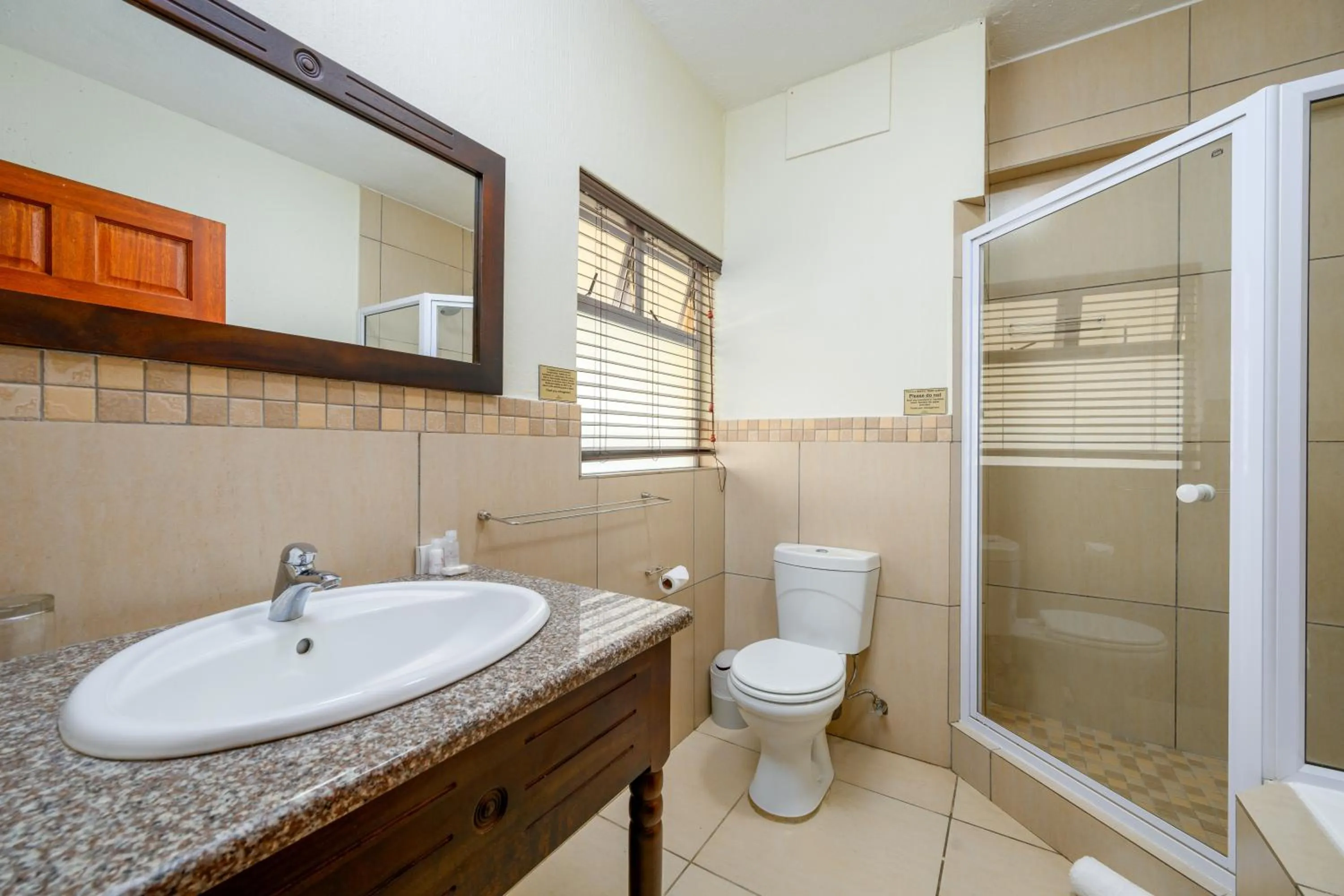 Bathroom in Umthunzi Hotel and Conference
