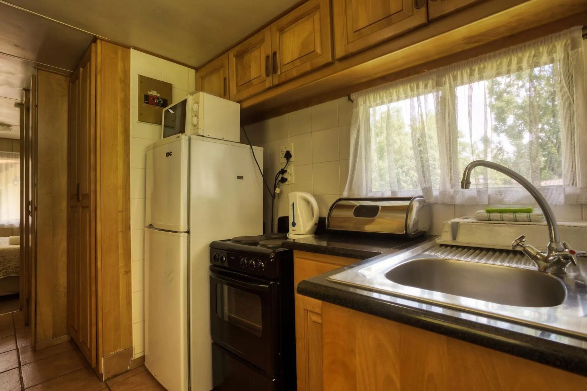 Kitchen or kitchenette in Merry Pebbles Resort