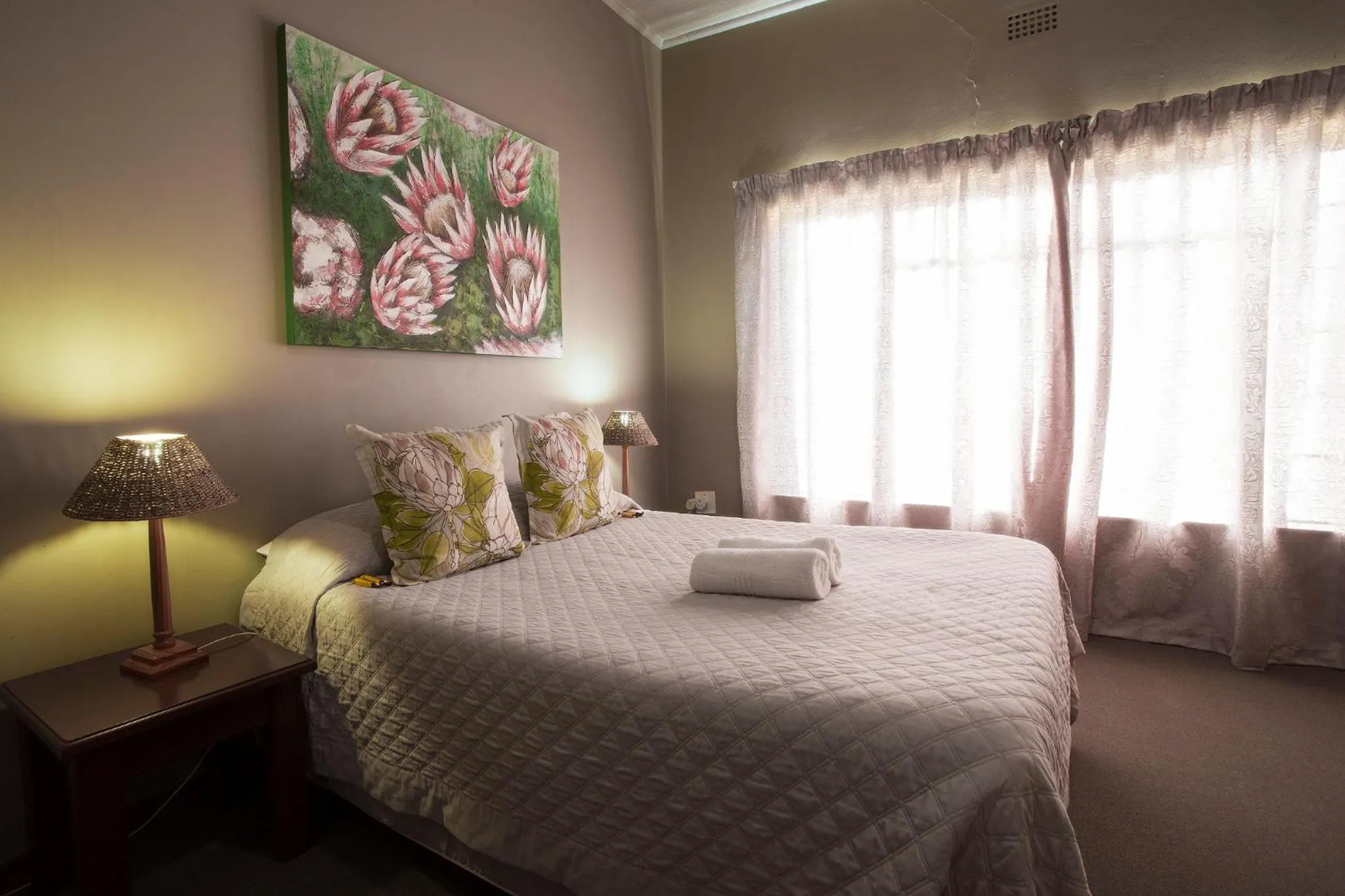 Bed in Merry Pebbles Resort