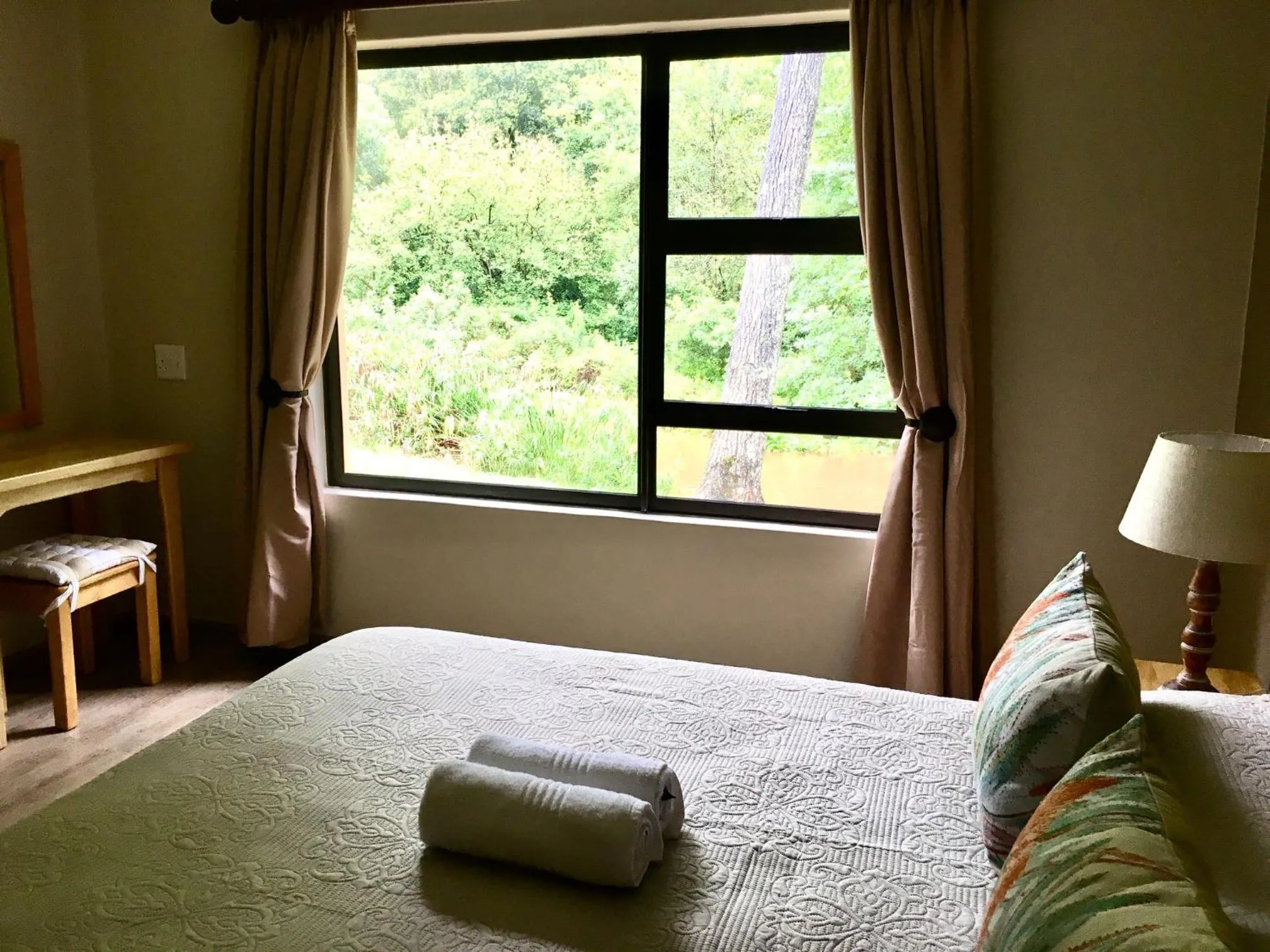 Bed in Merry Pebbles Resort