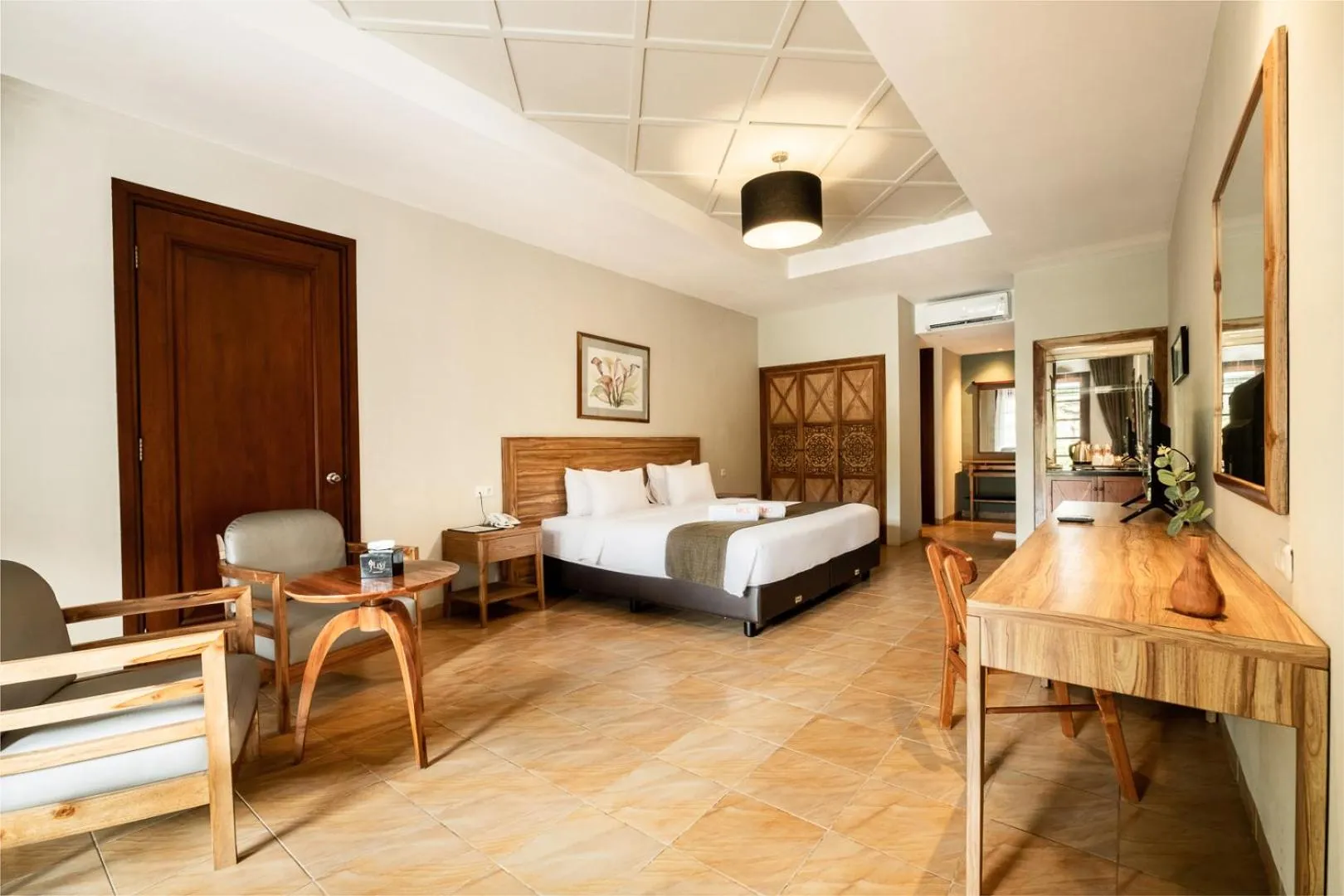 Bed in Mutiara Carita Cottages