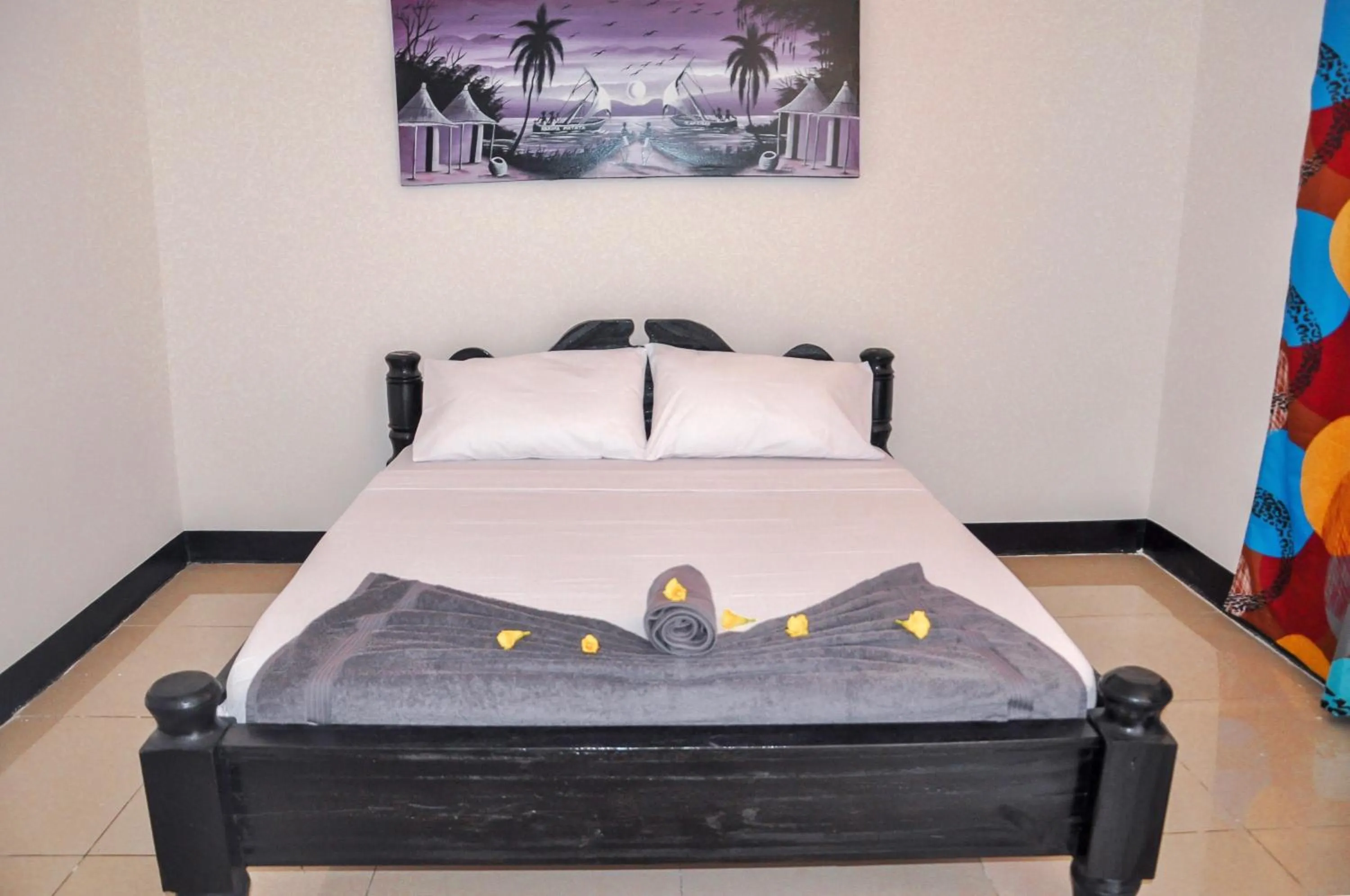 Bed in Papaya Guest House Nungwi