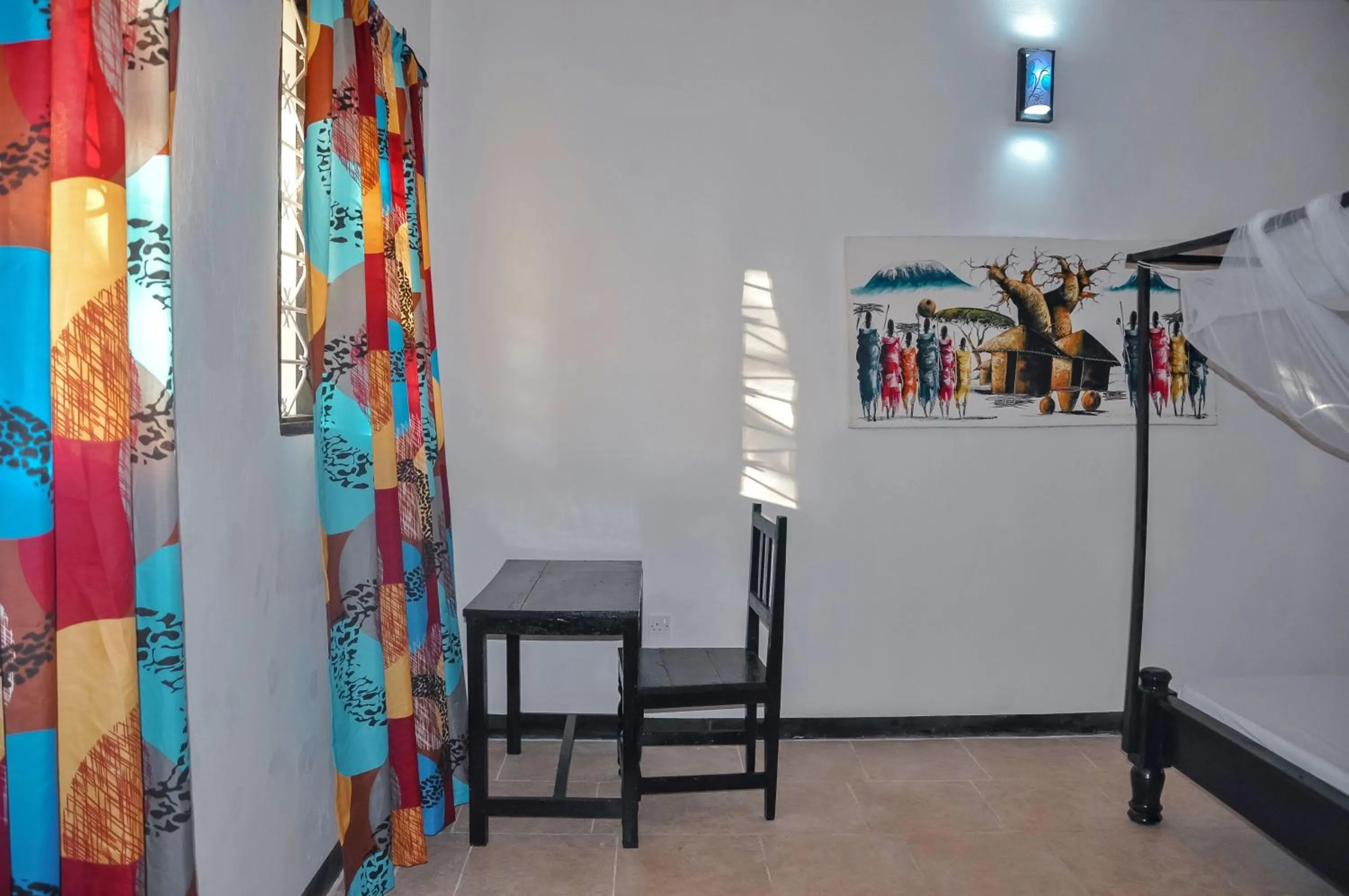 Seating area in Papaya Guest House Nungwi