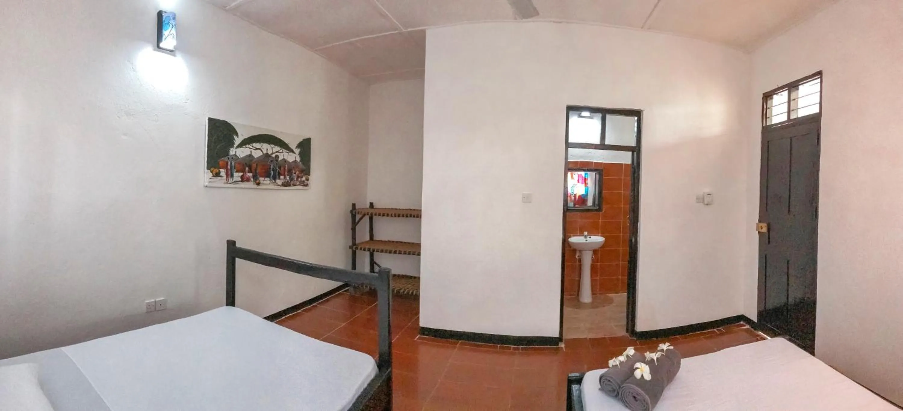 Photo of the whole room, Bed in Papaya Guest House Nungwi