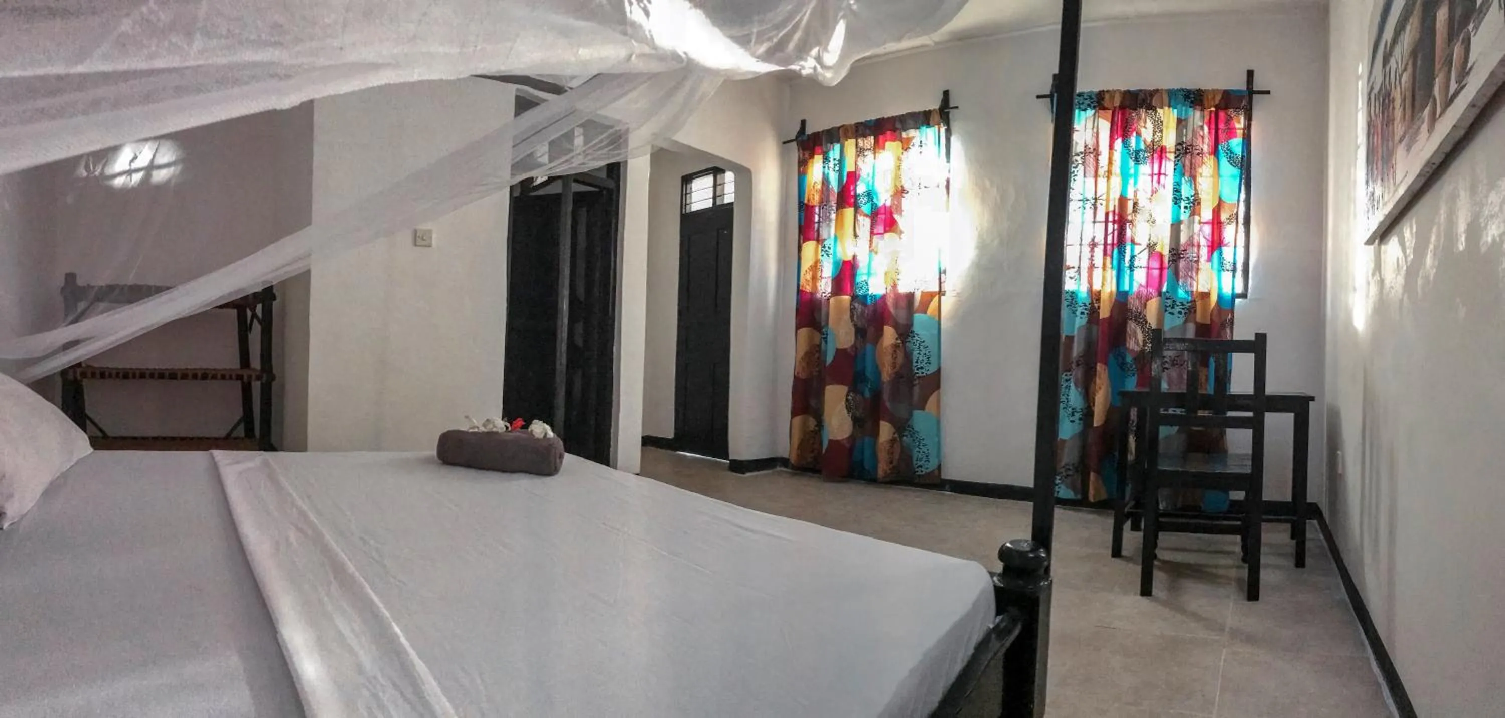 Photo of the whole room, Bed in Papaya Guest House Nungwi