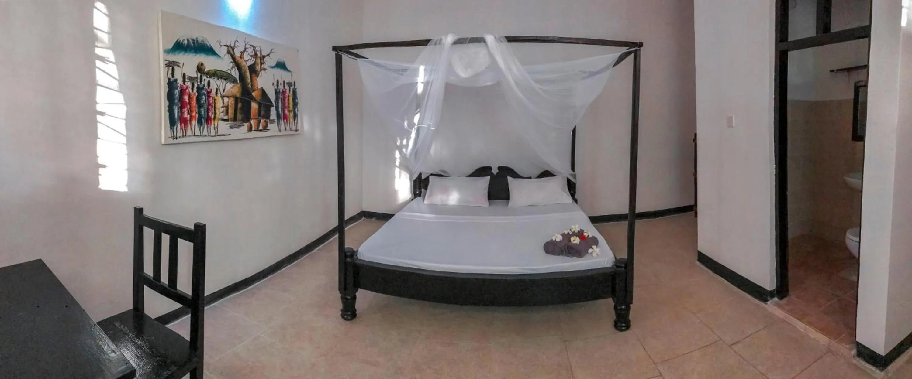 Bed in Papaya Guest House Nungwi