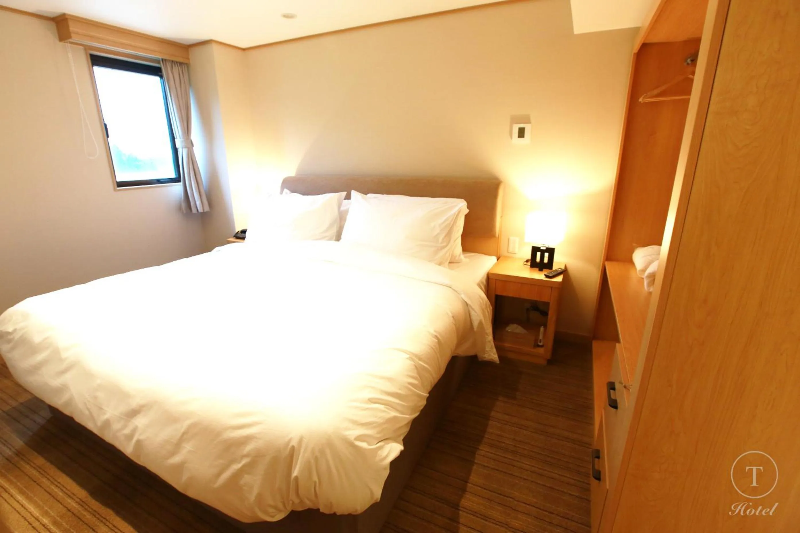Photo of the whole room, Bed in T Hotel Ryuoo