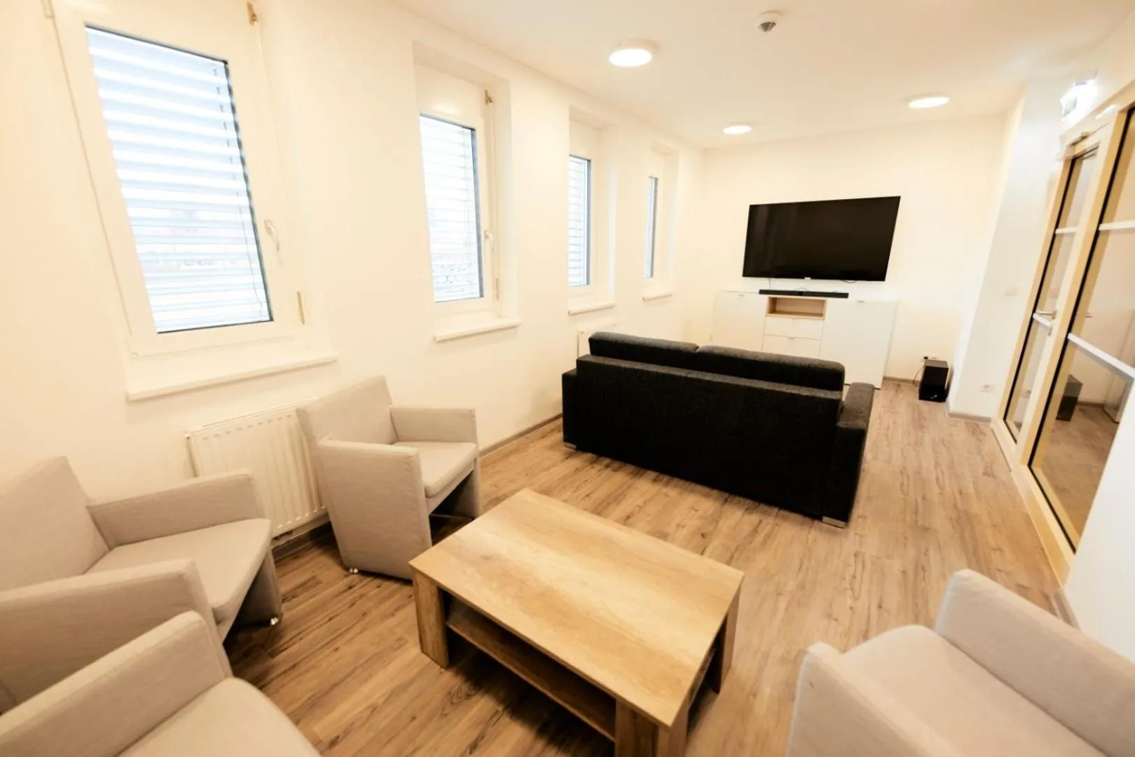 Communal lounge/ TV room in I AM HOTEL Leoben