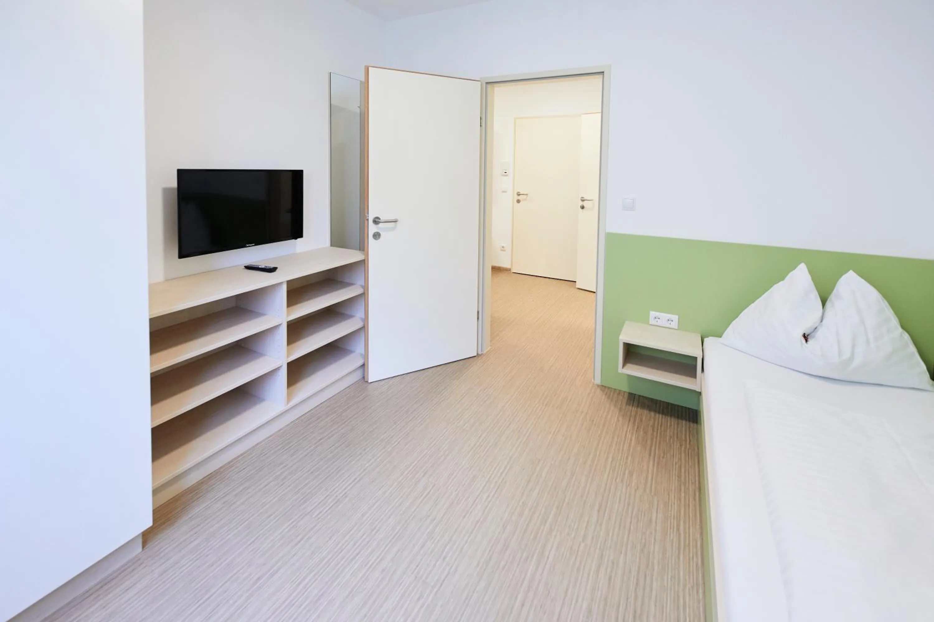 TV and multimedia, Bed in I AM HOTEL Leoben