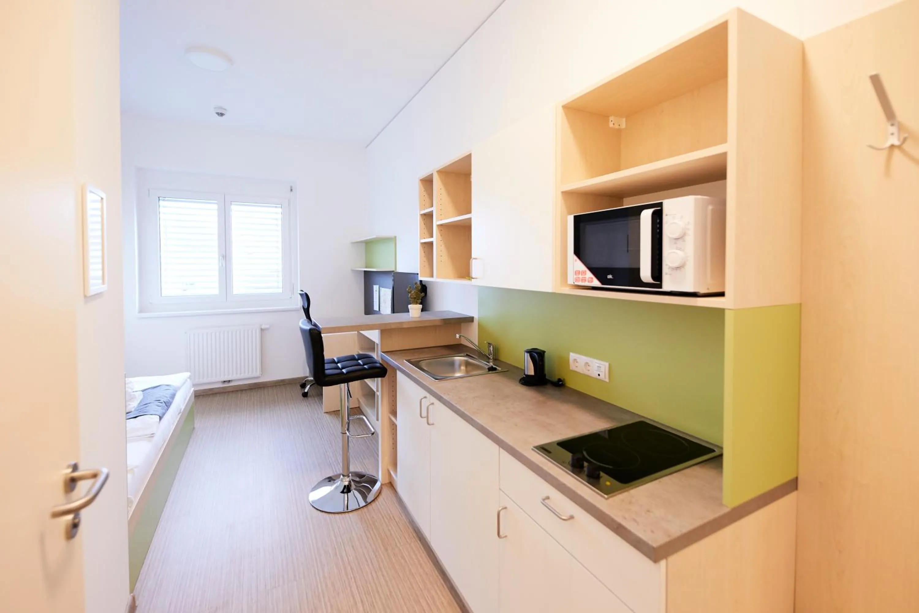 Kitchen or kitchenette in I AM HOTEL Leoben