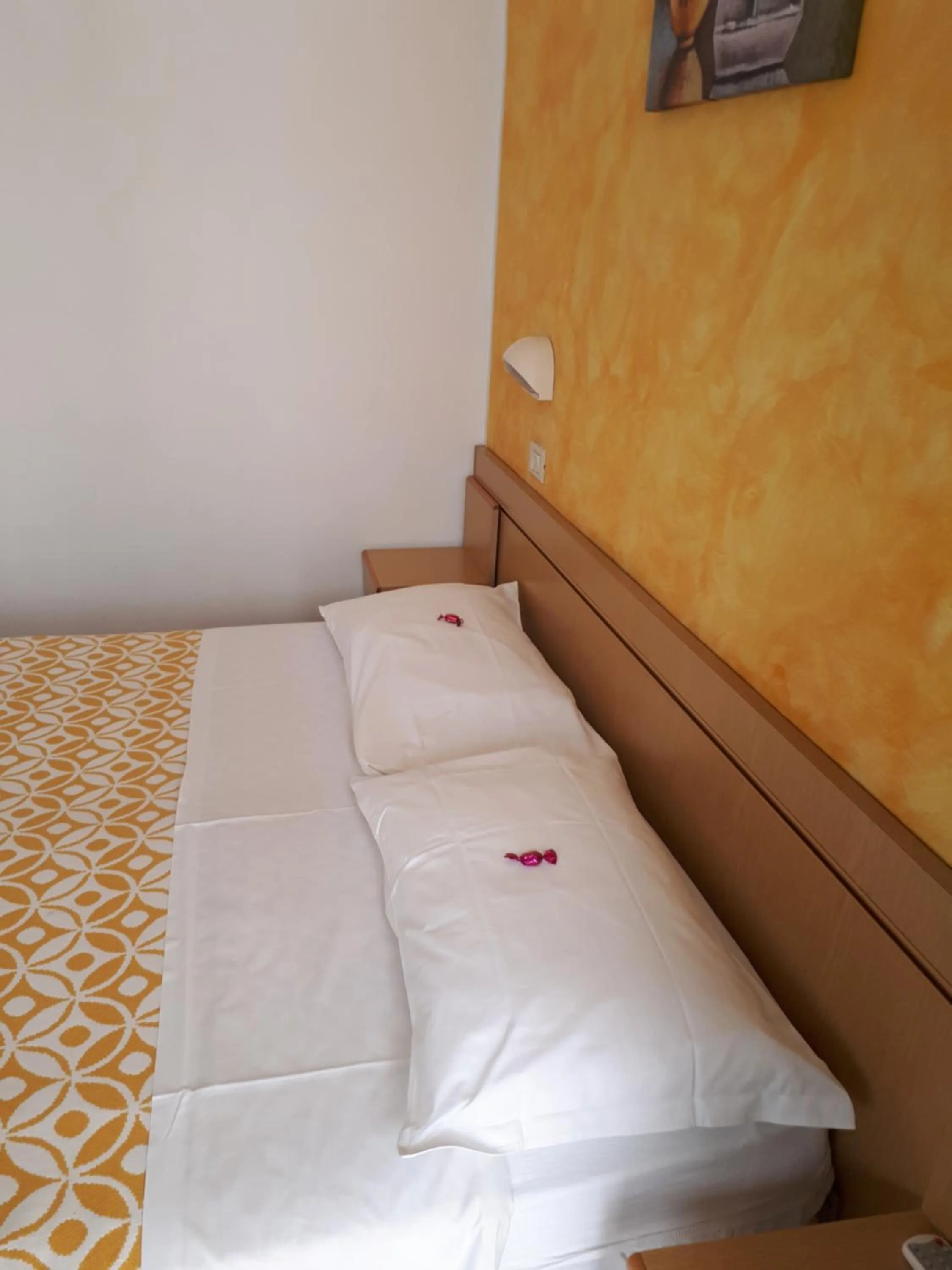Bed in Hotel Ottavia
