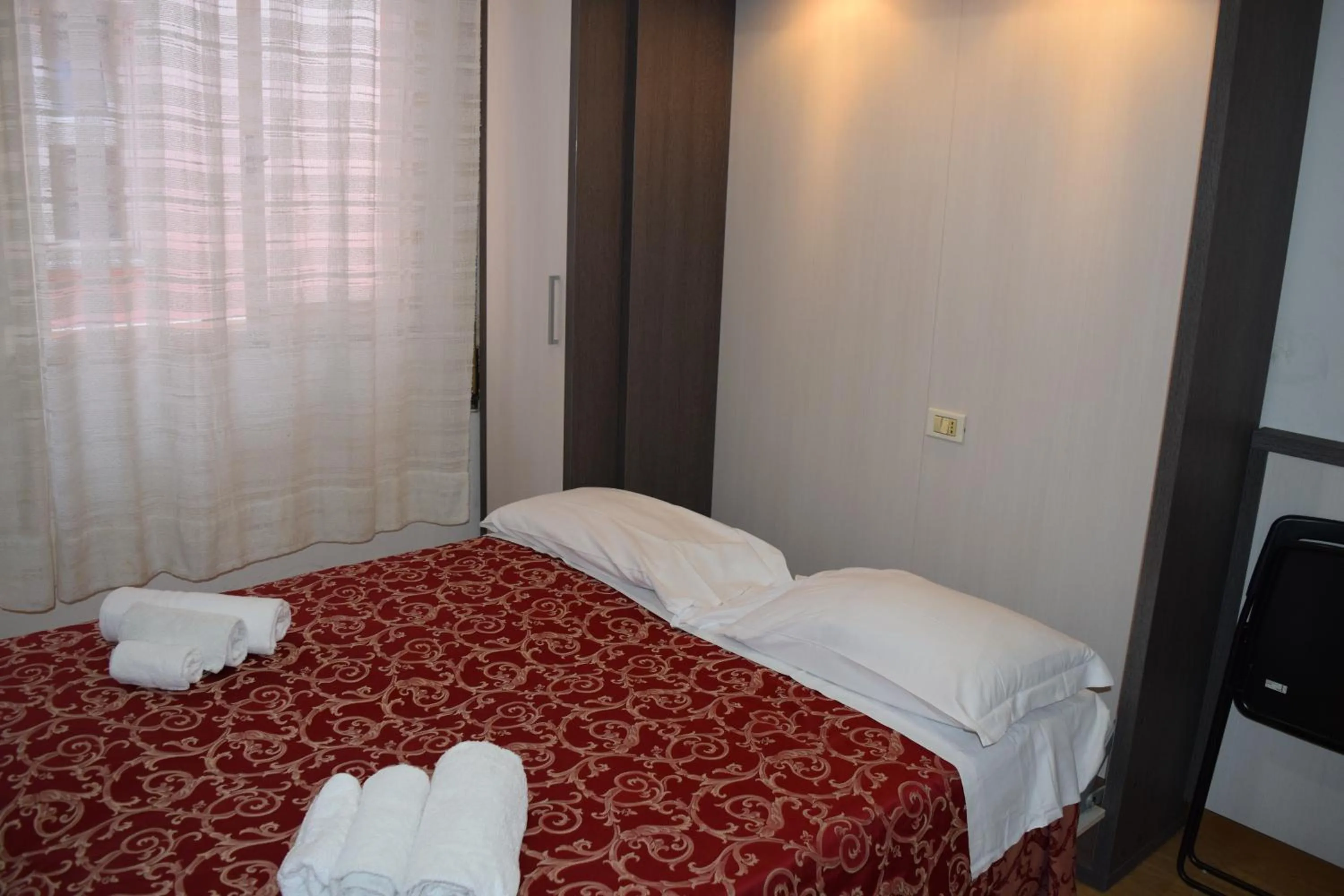 Bed in Hotel Ottavia