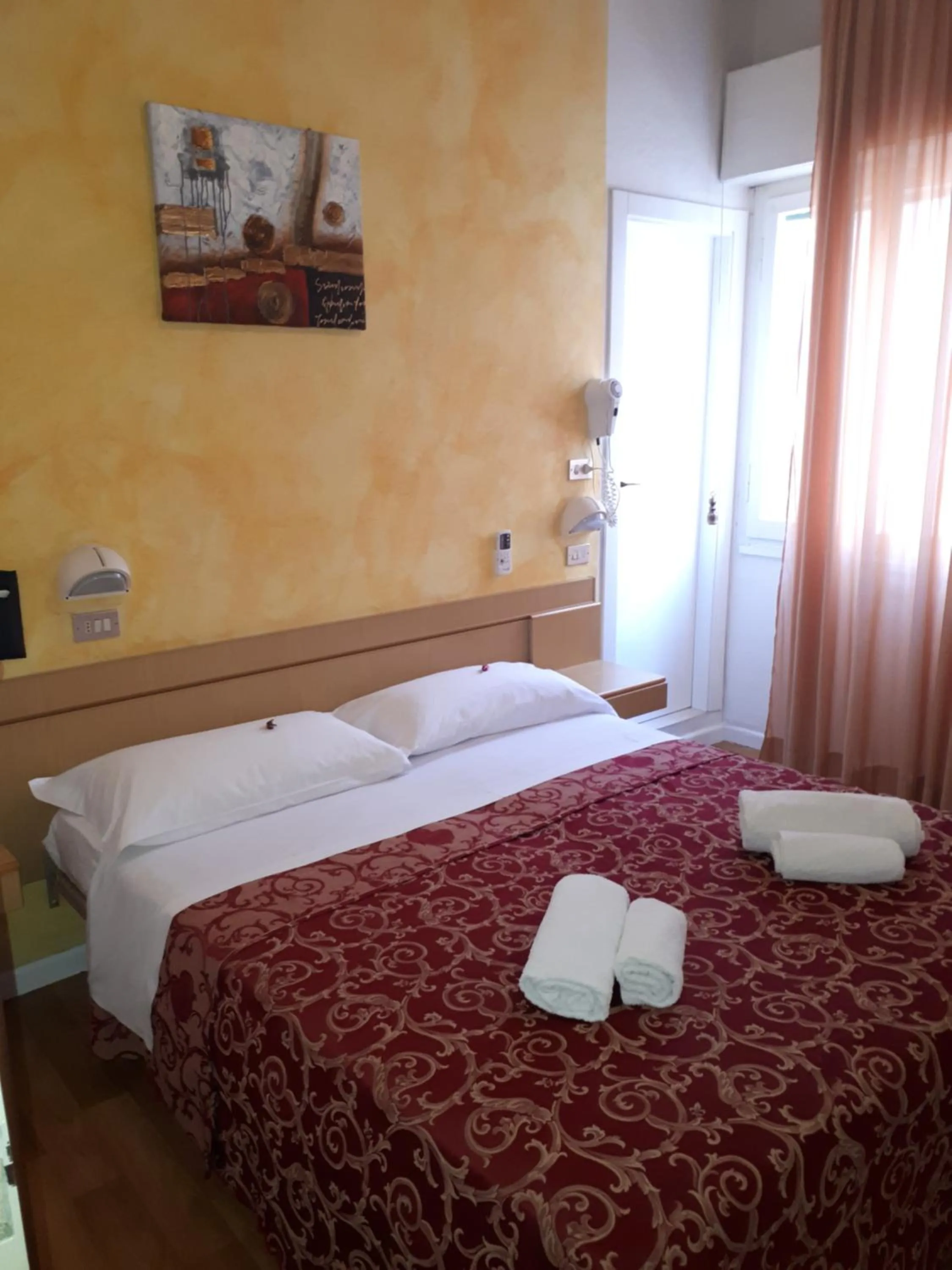 Bed in Hotel Ottavia