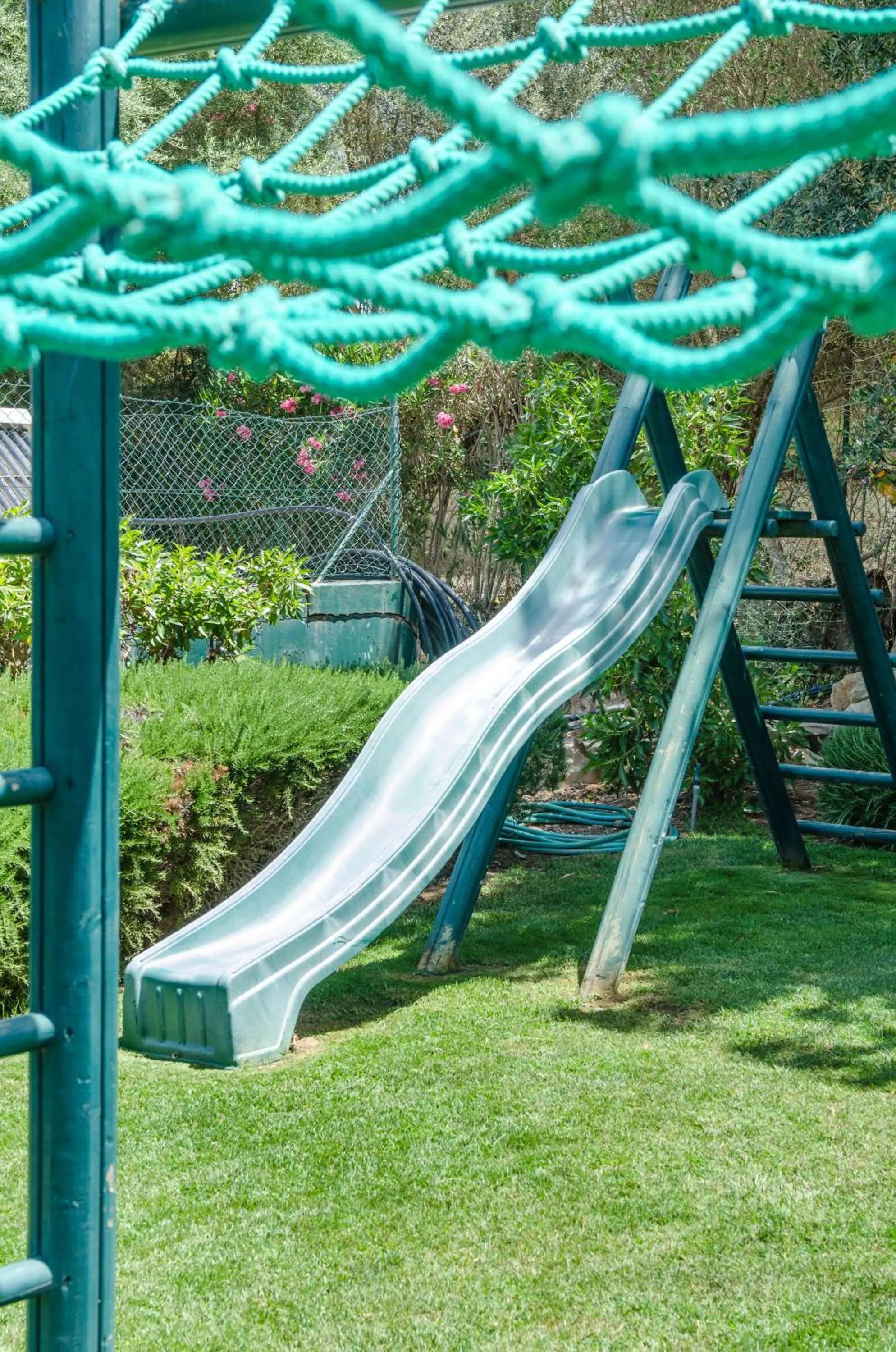 Children play ground in Jardim da Meia Praia Resort