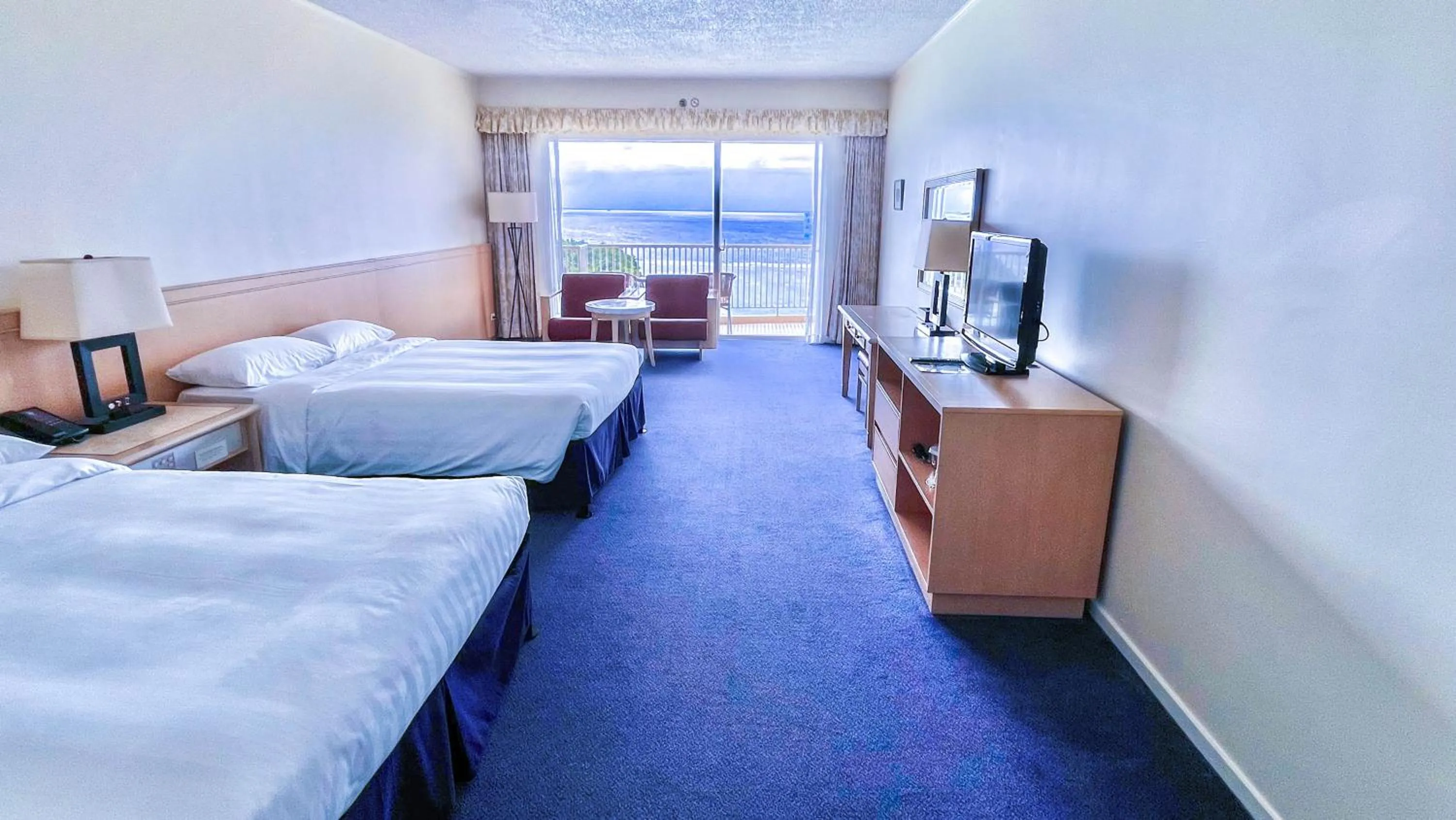 Bed in Hoshino Resorts RISONARE Guam