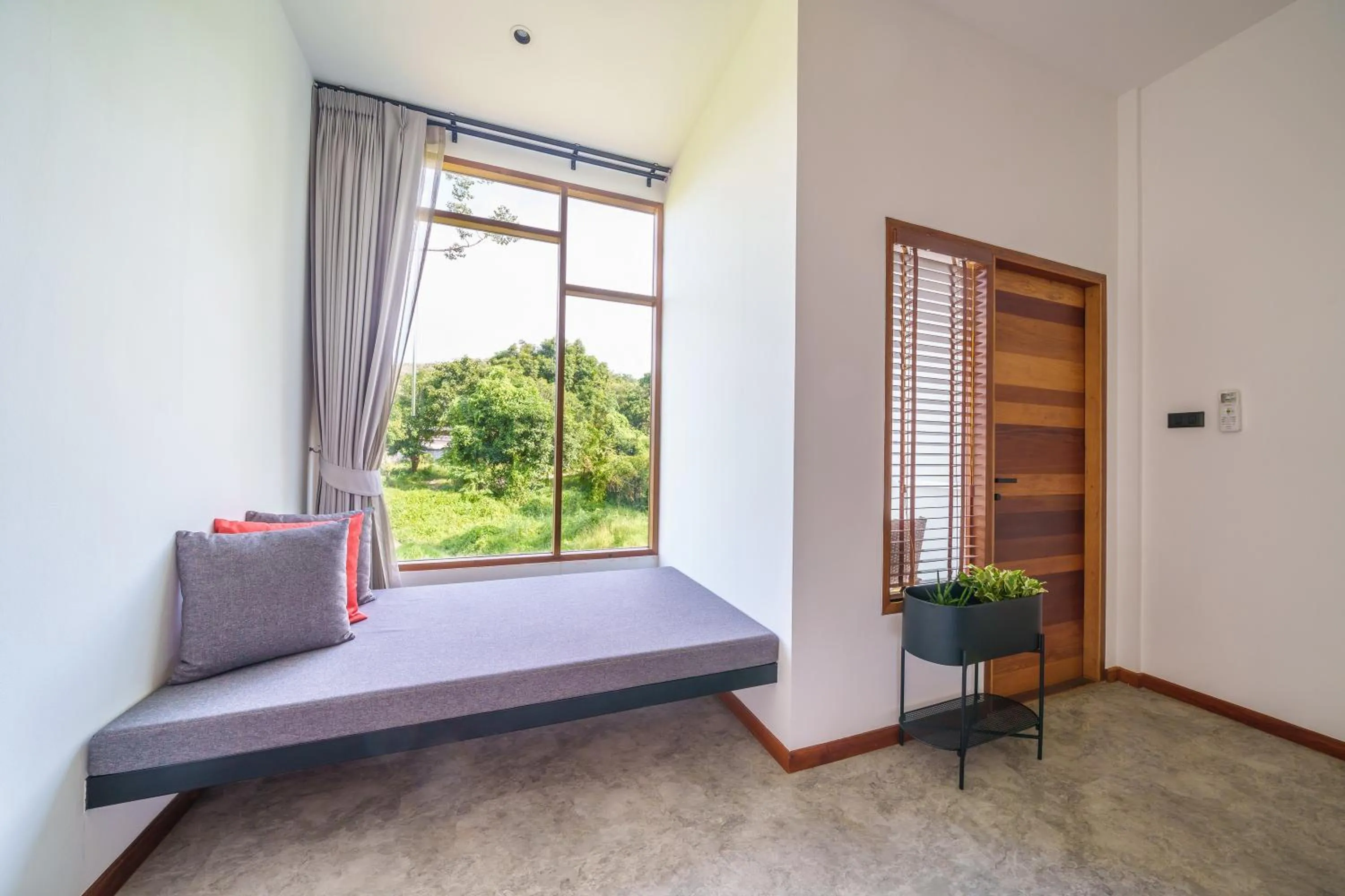 Seating area, Bed in Baan Ploy Sea