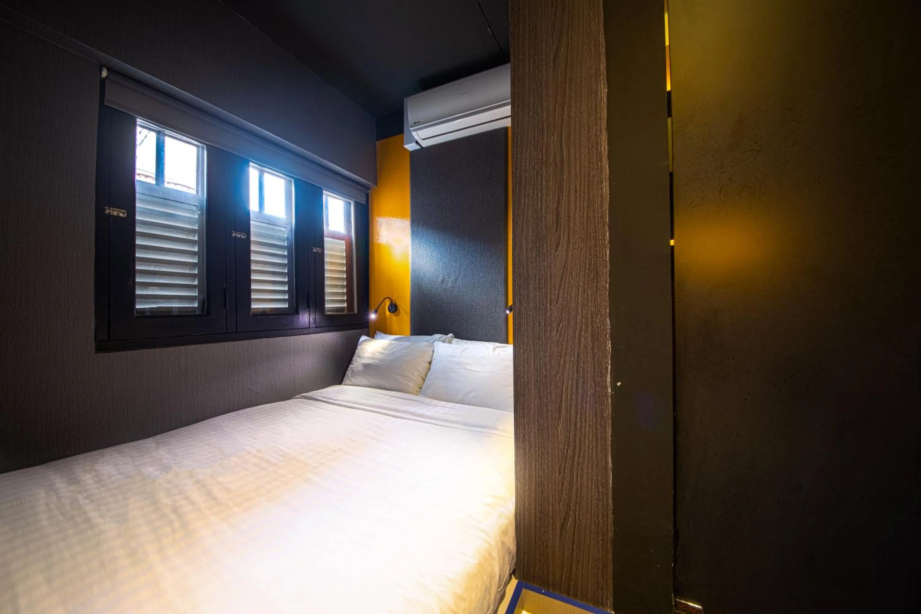 Photo of the whole room, Bed in CUBE Family Boutique Capsule Hotel at Chinatown