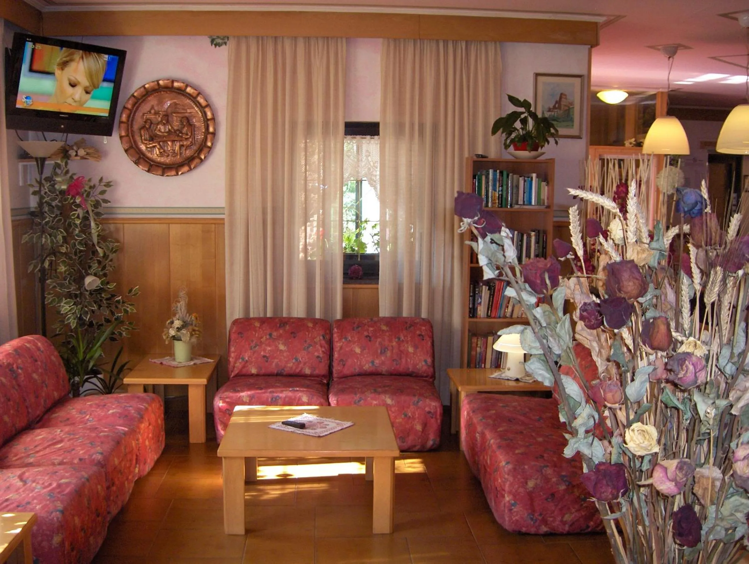 Communal lounge/ TV room in Hotel Allo Zodiaco