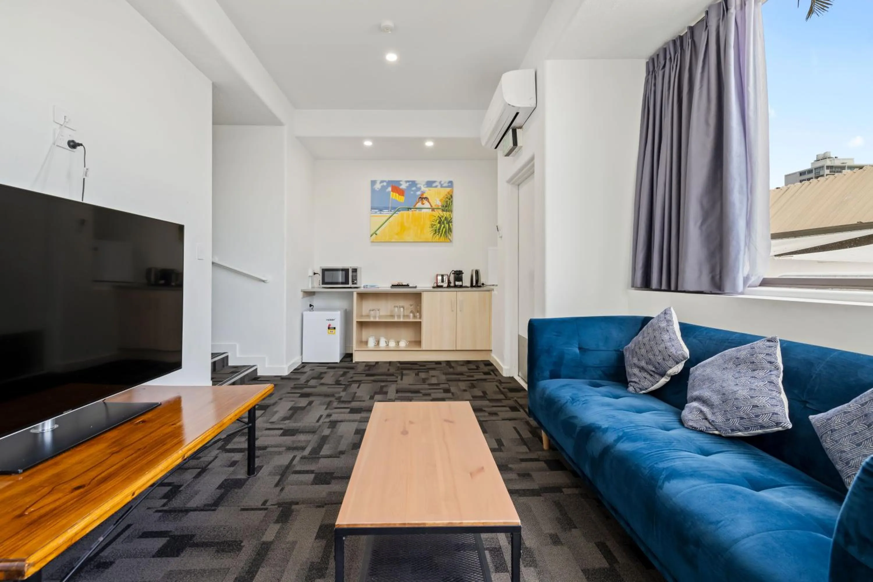 TV and multimedia in Tiki Hotel Apartments Surfers Paradise