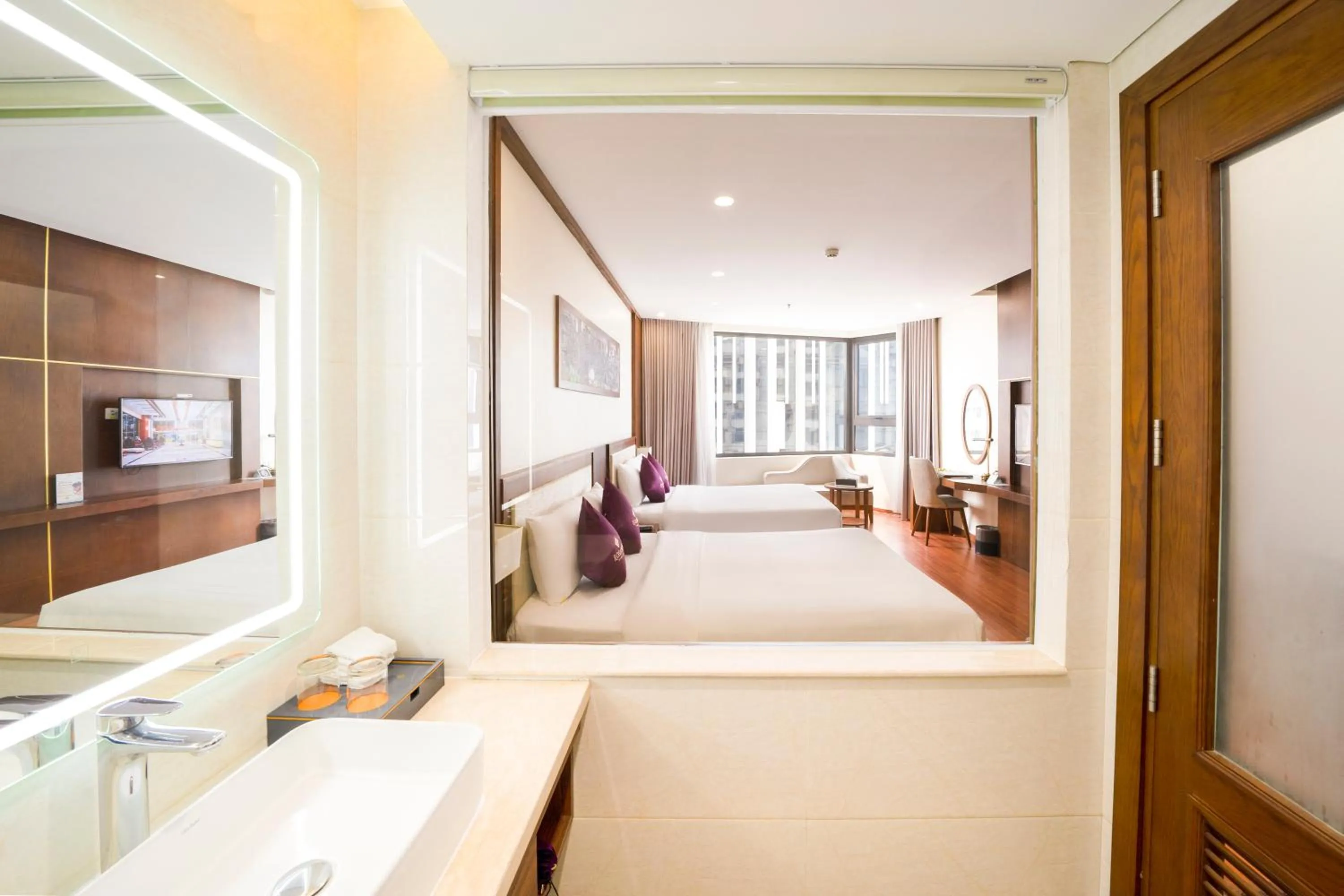 Bed in Rosamia Da Nang Hotel