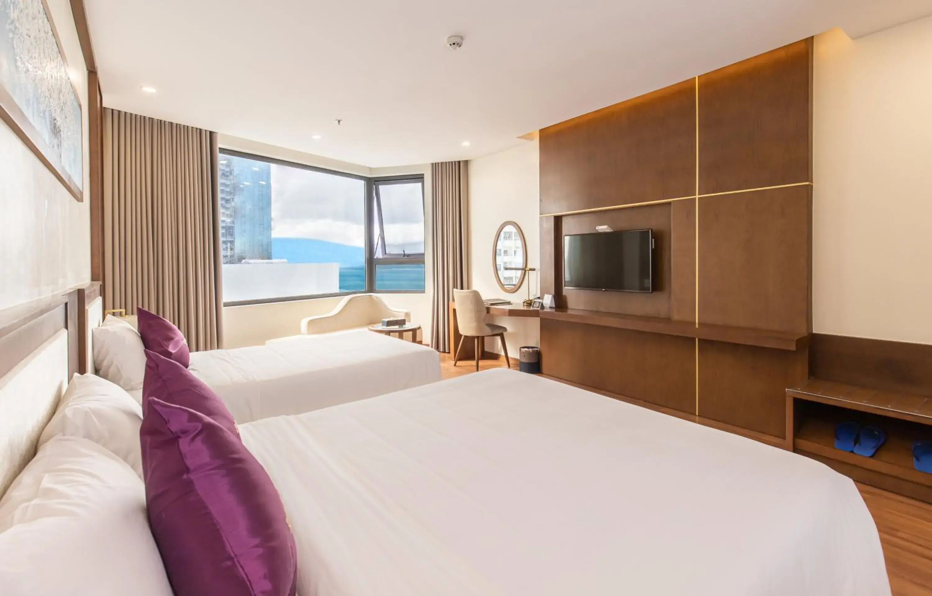 Grand Triple Room , Partial Ocean View with Afternoon Tea Per Stay in Rosamia Da Nang Hotel Grand Triple Room , Partial Ocean View with Afternoon Tea Per Stay in Rosamia Da Nang Hotel