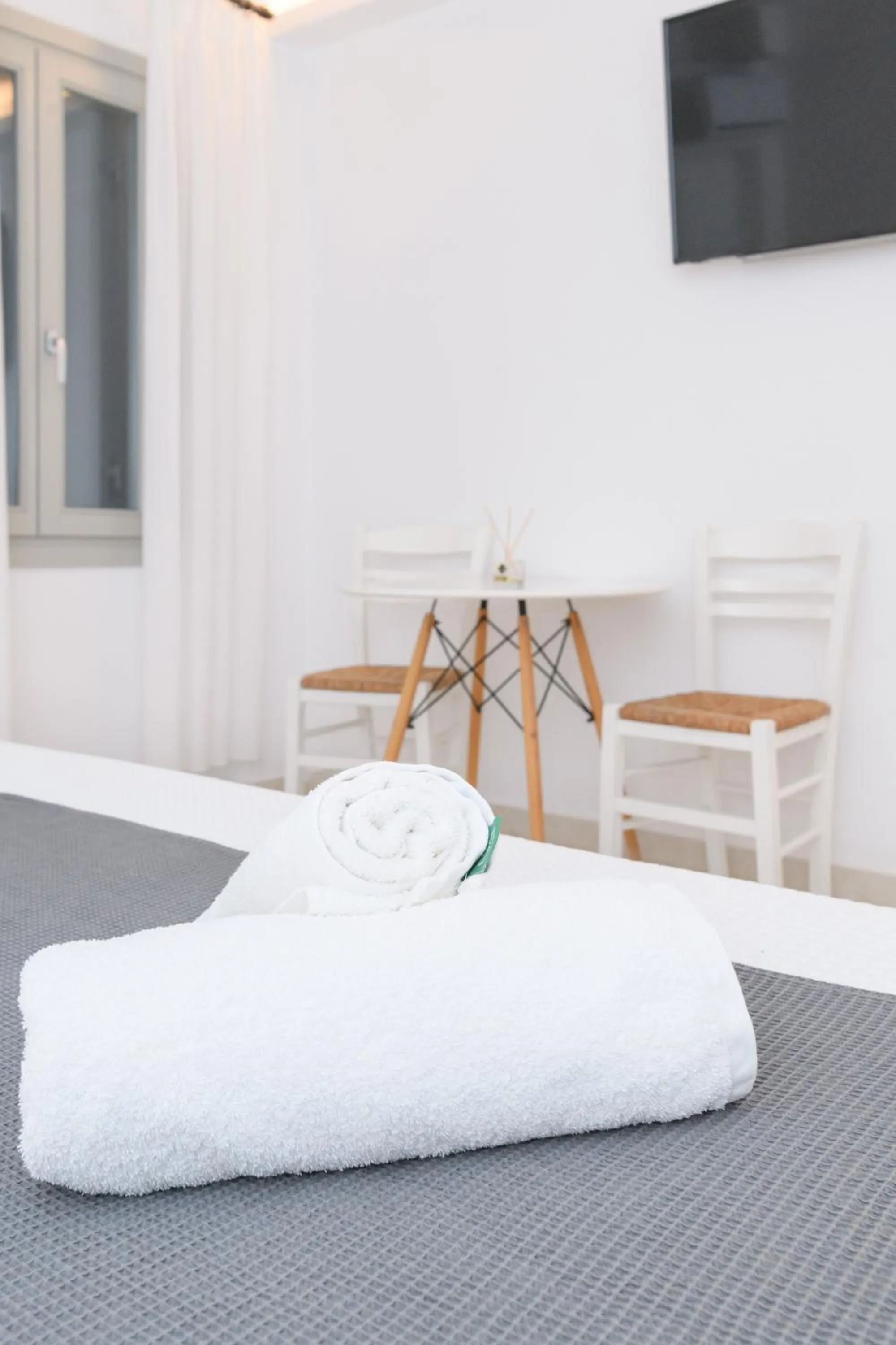 towels, Bed in Sunset View Hotel