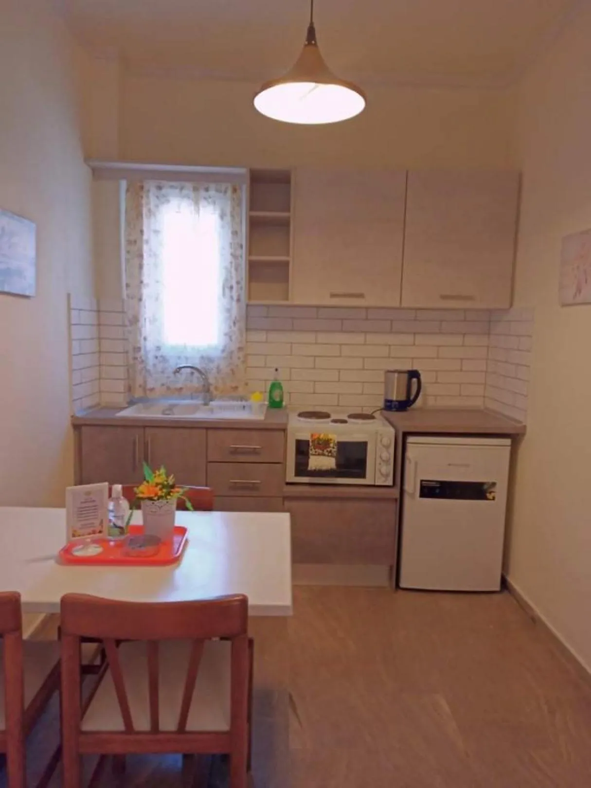 Kitchen or kitchenette in Corfu Sunflower Apartments