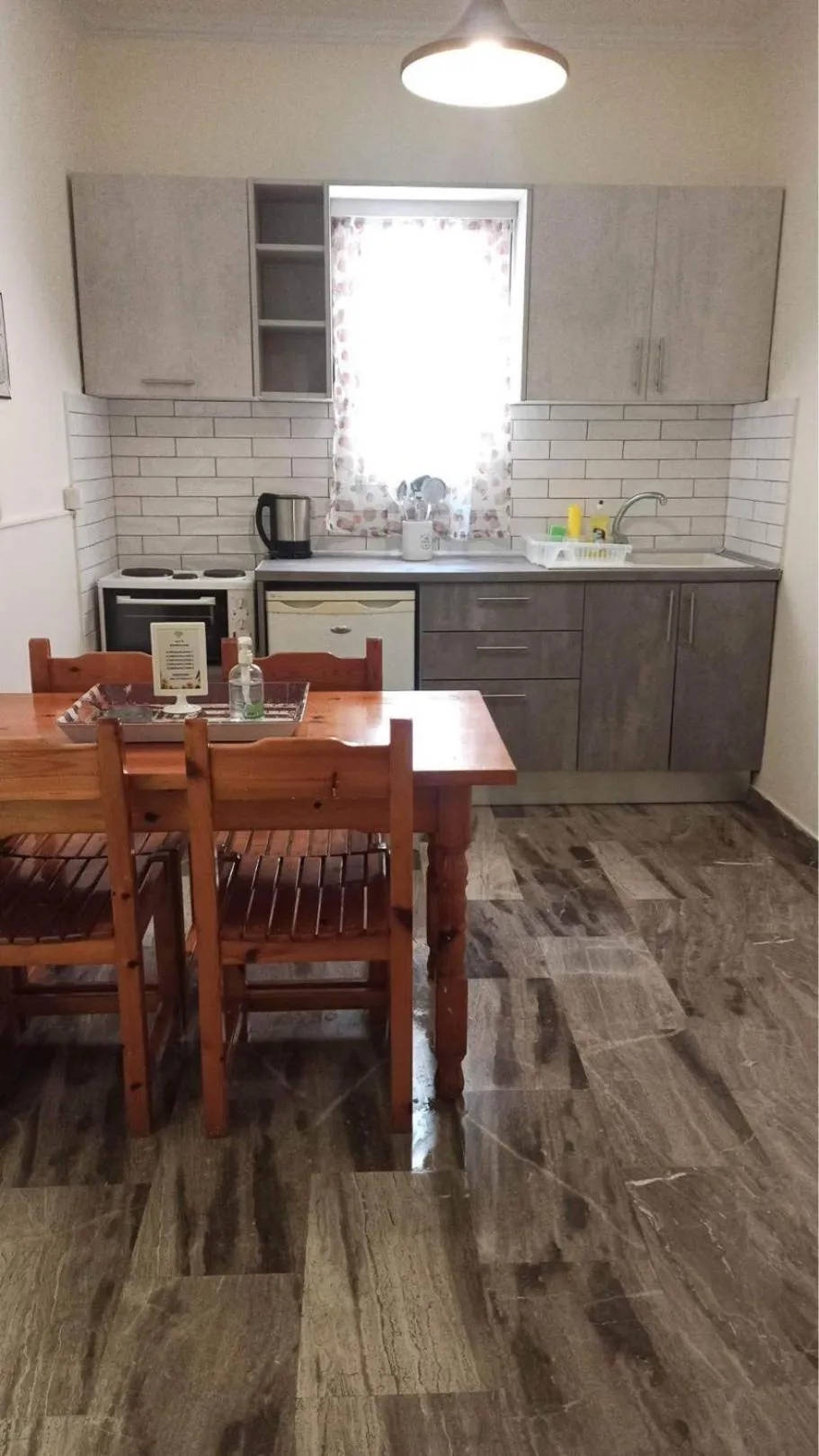 Kitchen or kitchenette in Corfu Sunflower Apartments