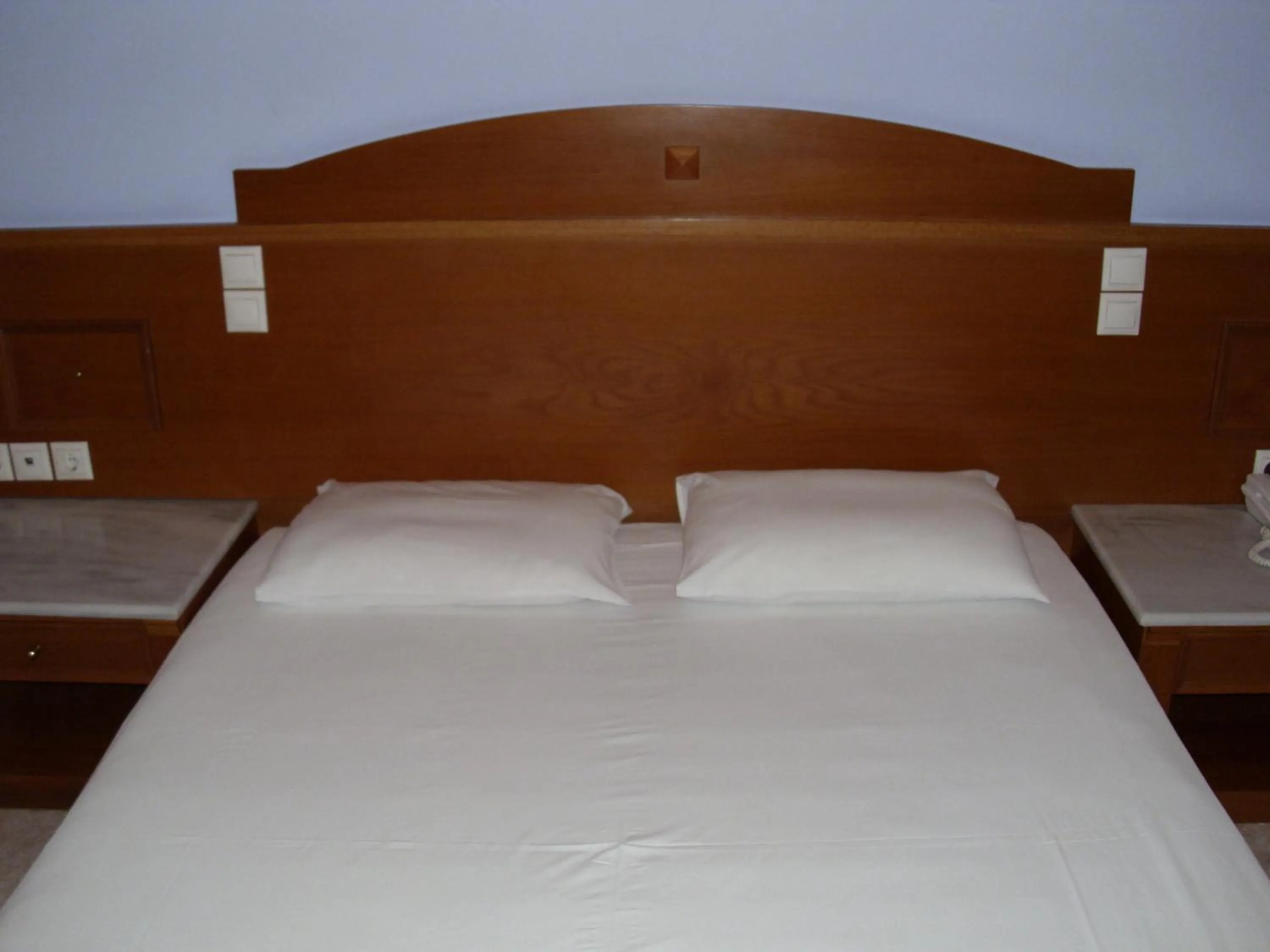Bed in Hotel Cybele Pefki