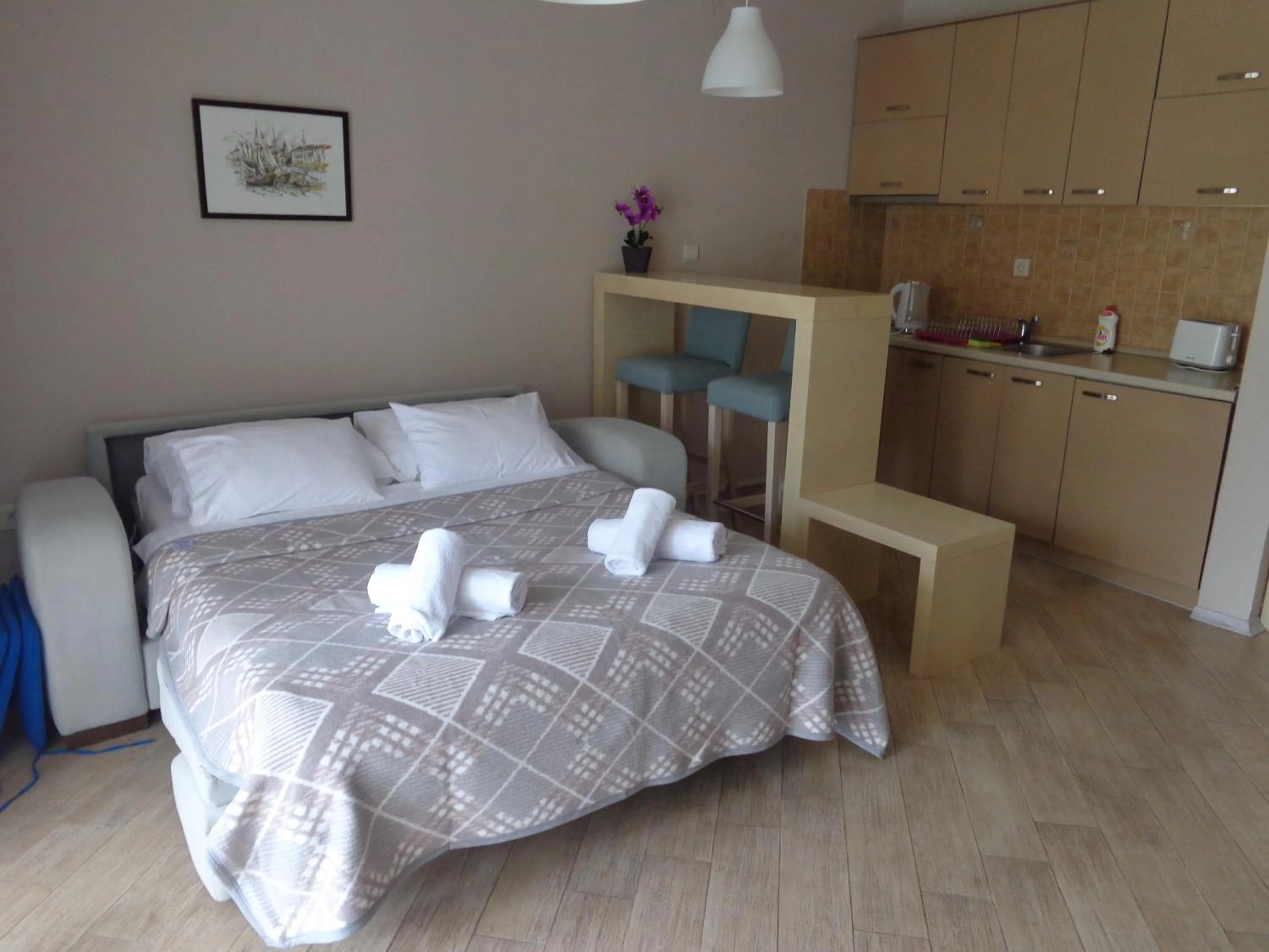 Living room, Bed in Apartments Bella di Mare