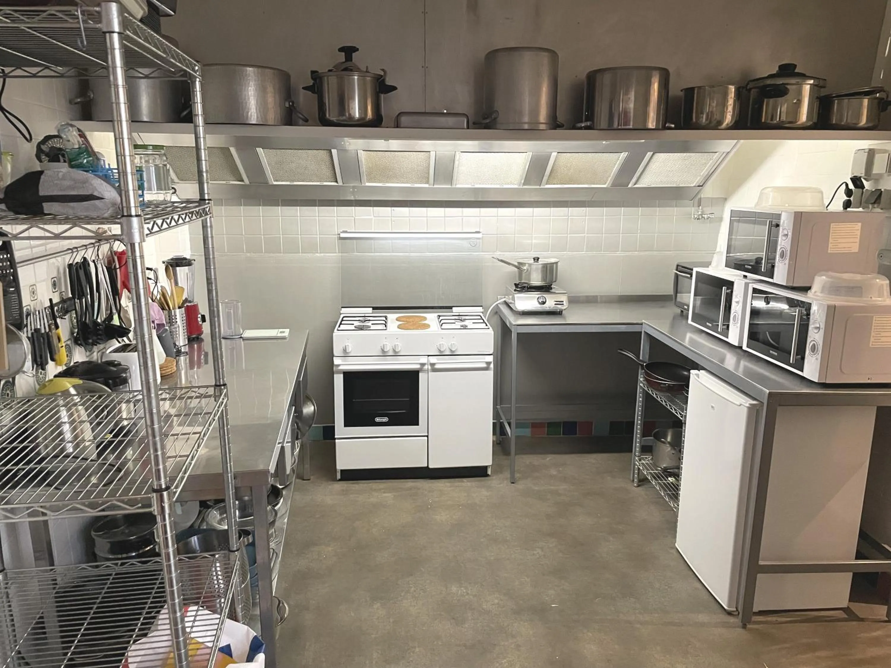 Communal kitchen in Hébergement Artense