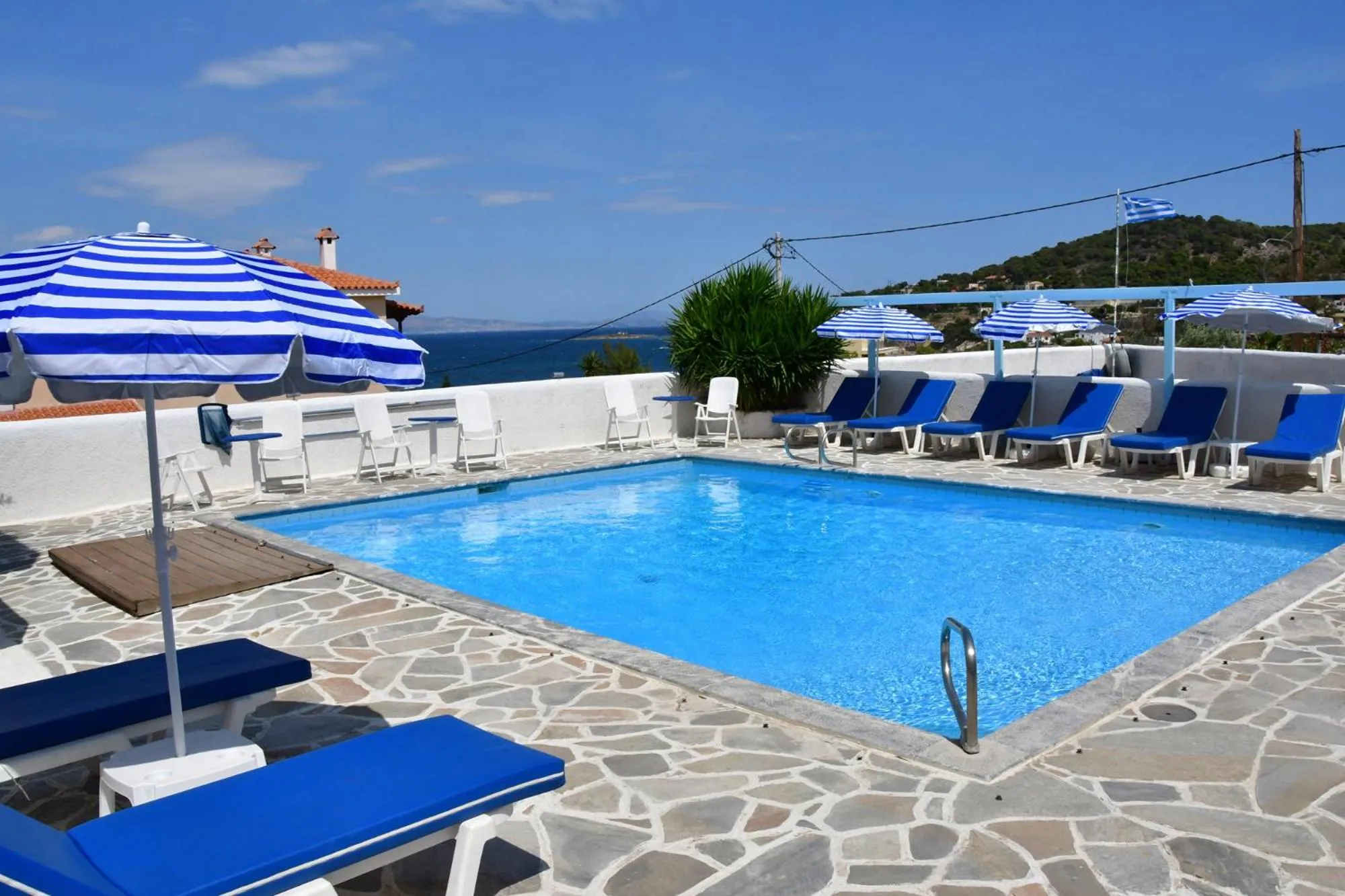 Swimming pool in Blue Dolphin Studios and Apartment