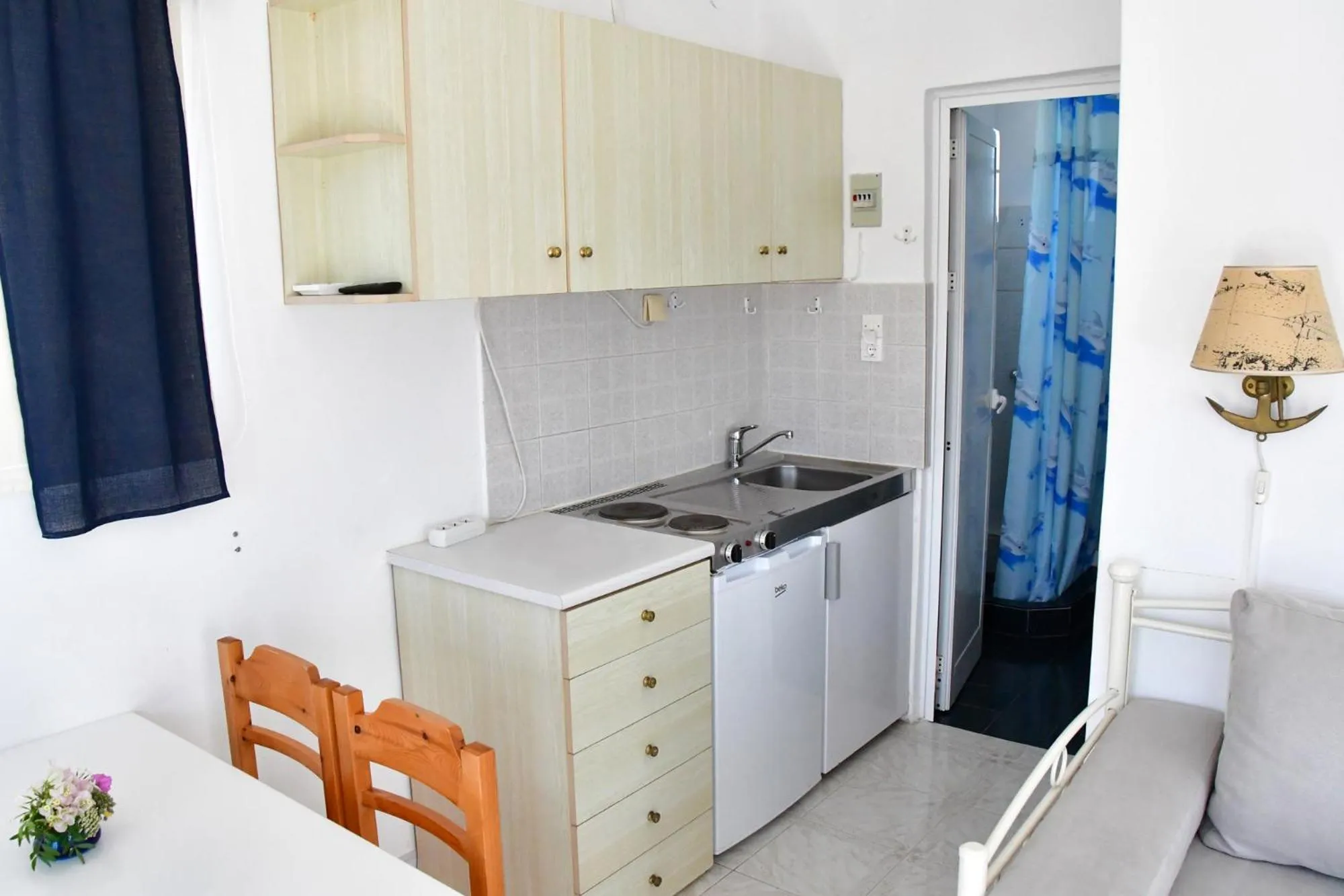 Kitchen or kitchenette in Blue Dolphin Studios and Apartment
