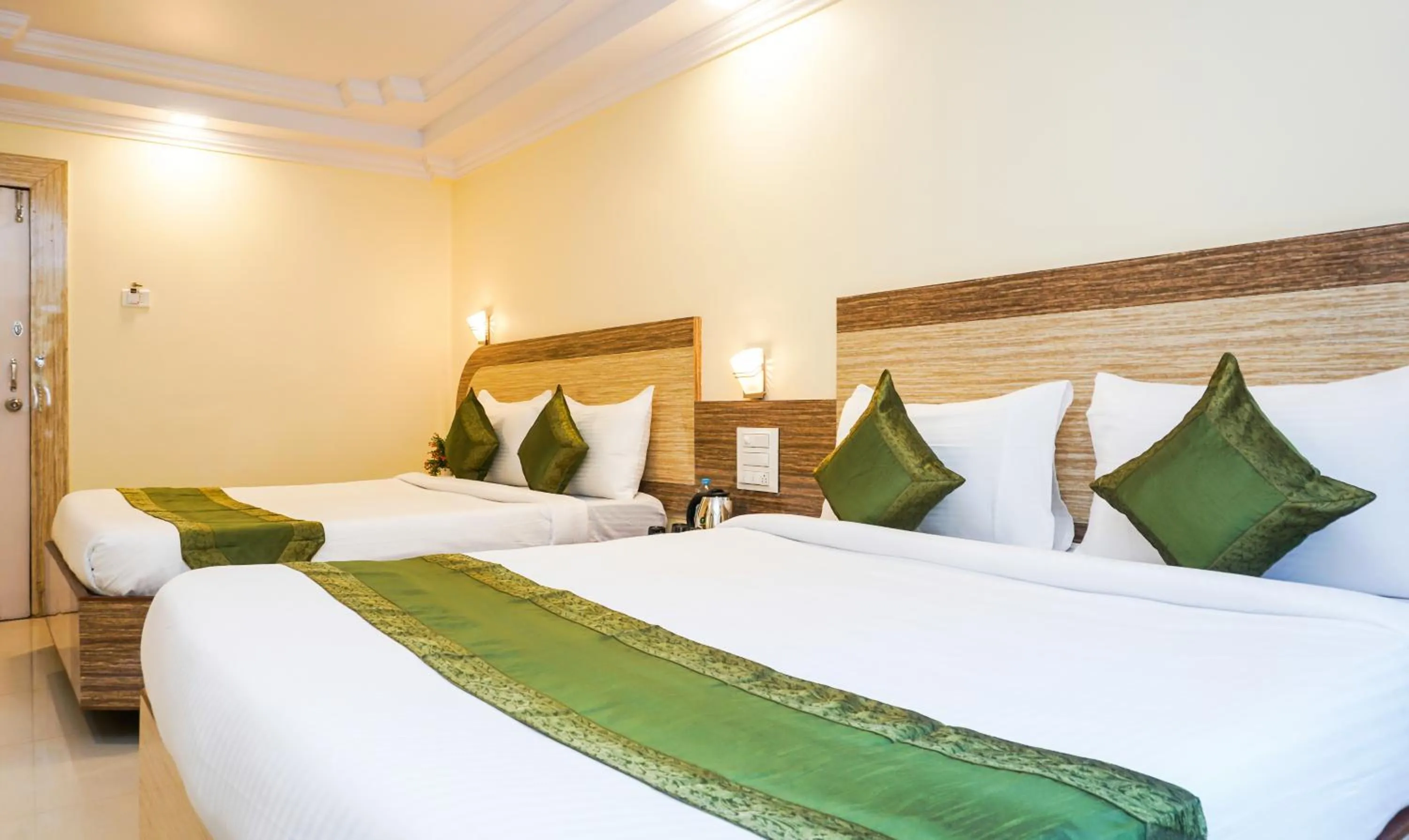 Bedroom, Bed in Treebo Hillway Inn Main Market