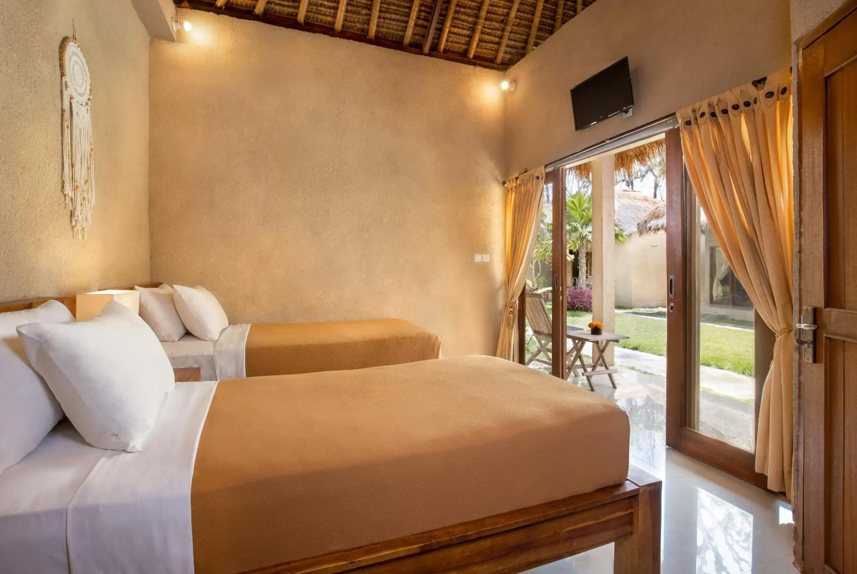 Deluxe Twin Room Garden View in Nusa Majesty Deluxe Twin Room Garden View in Nusa Majesty