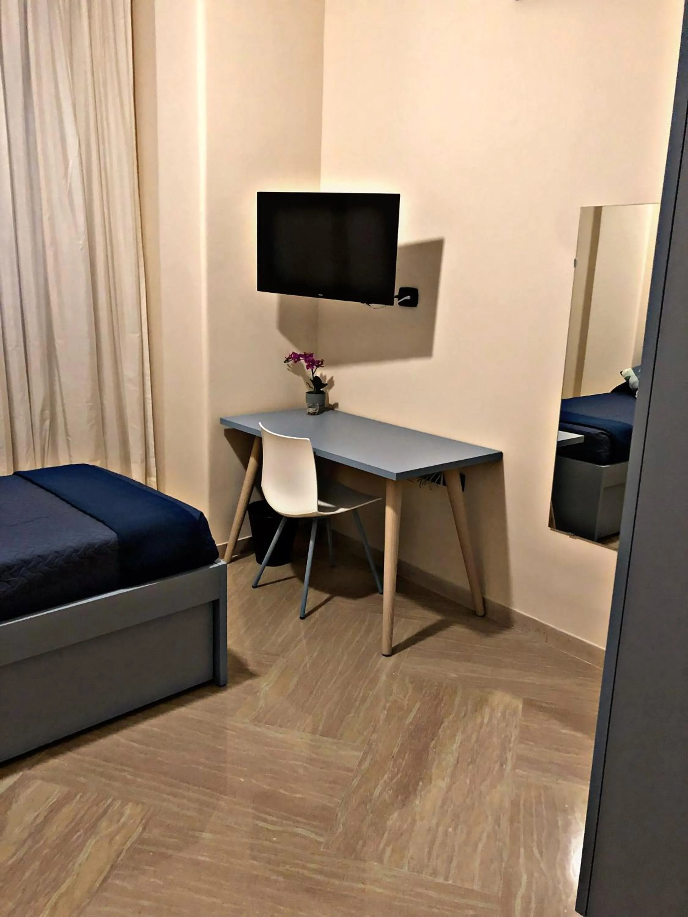 Bed in Napoli City Inn