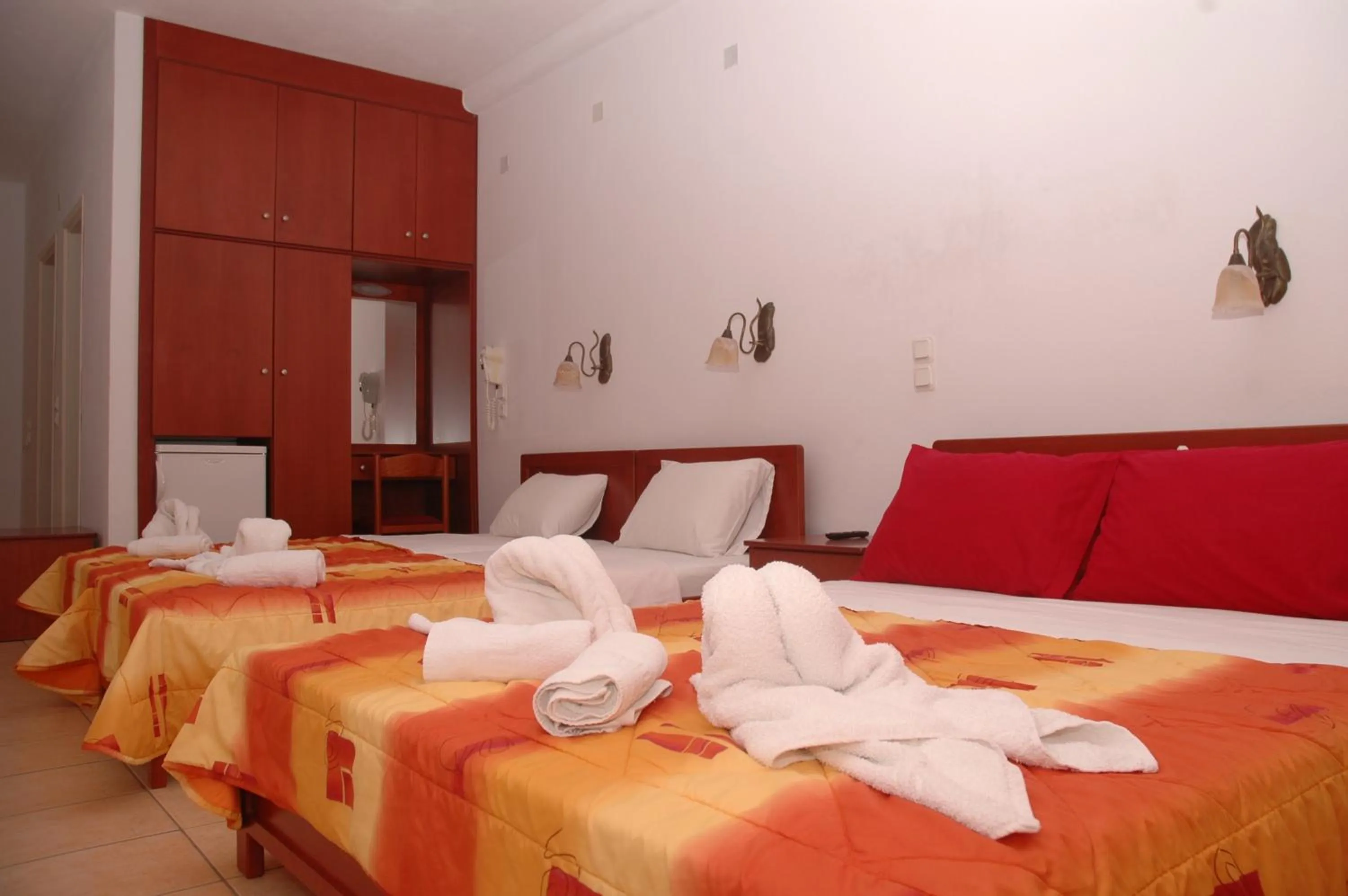 Bed in Agnanti Hotel