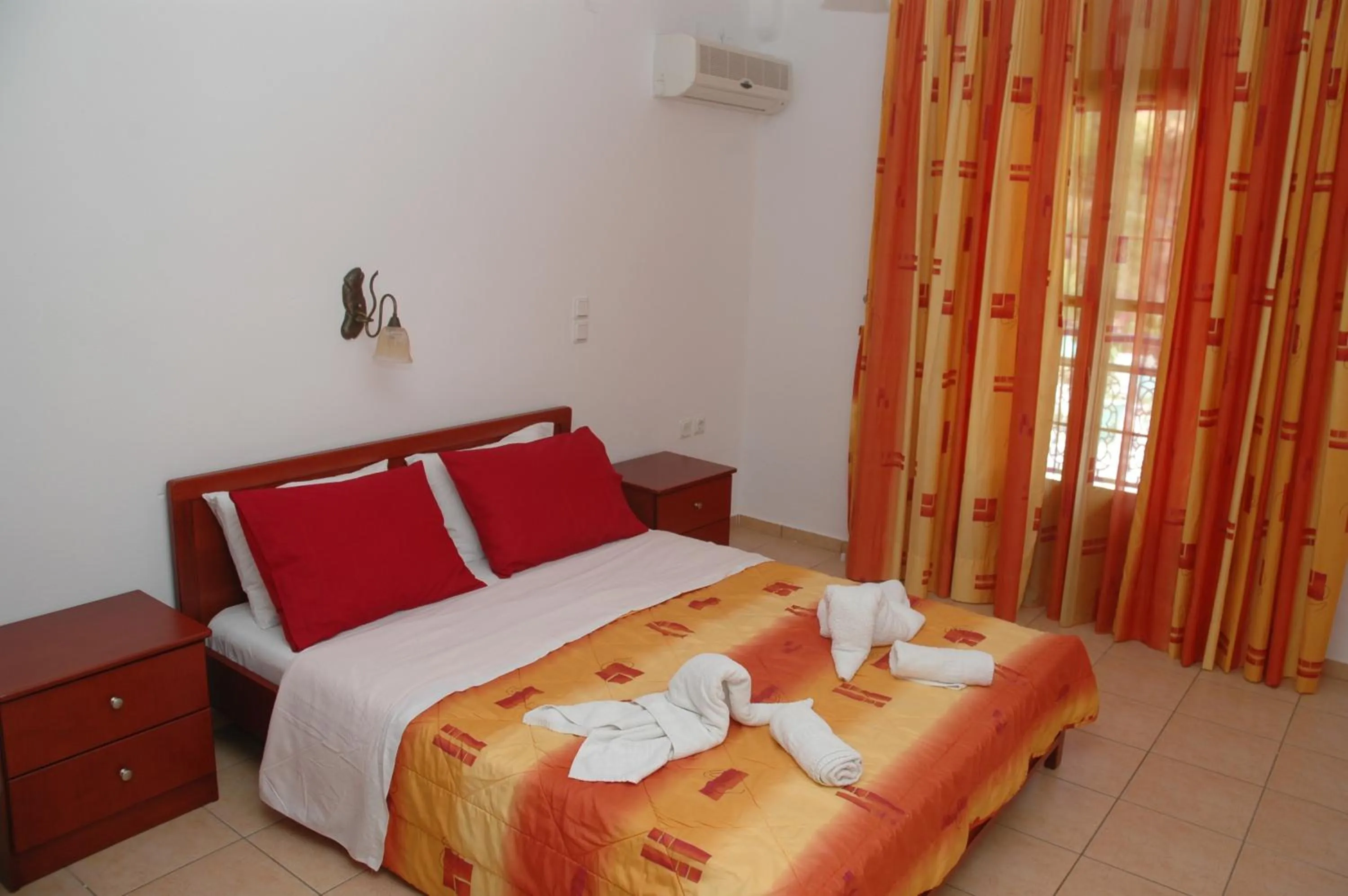 Bed in Agnanti Hotel